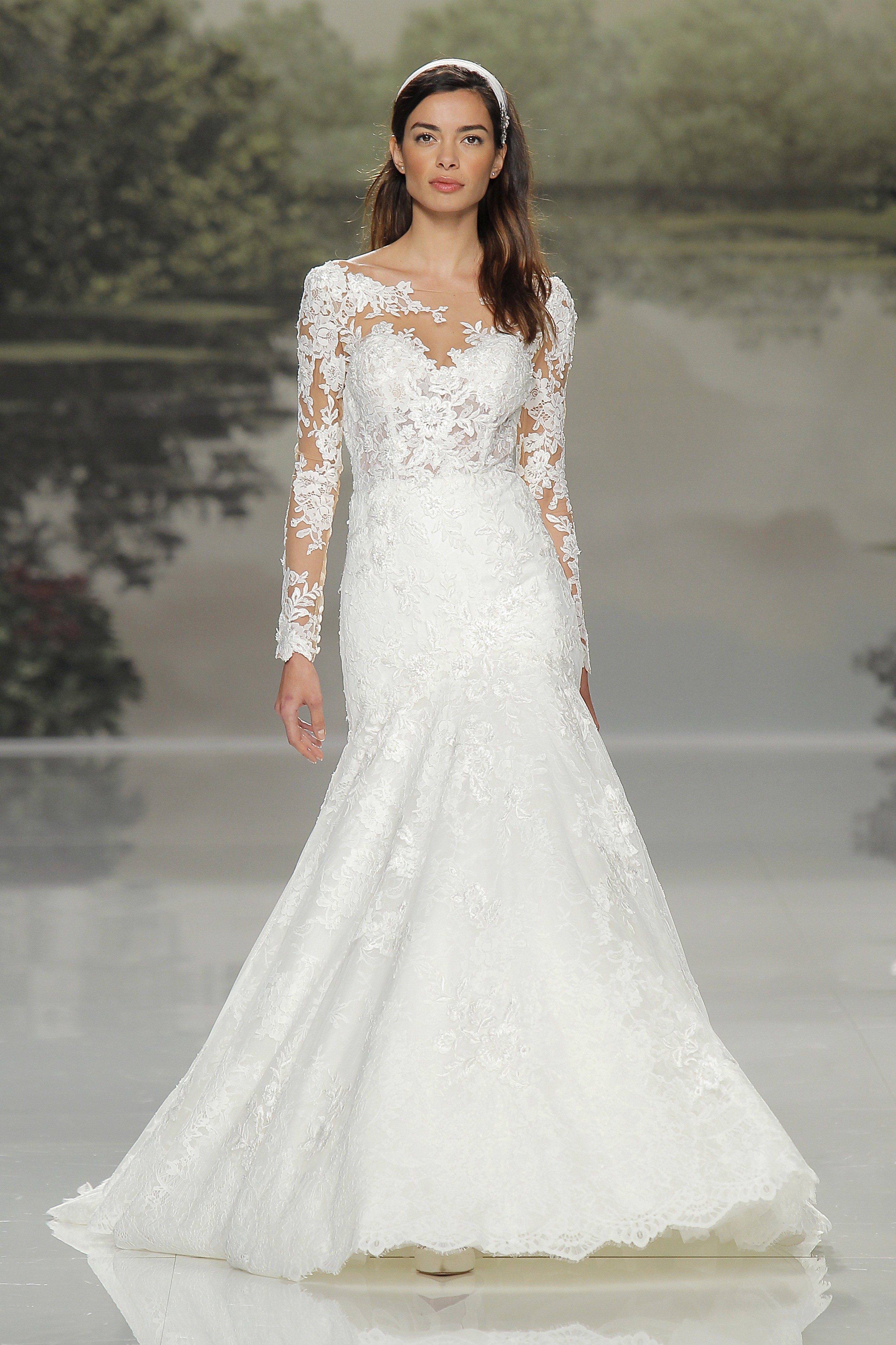Studio St. Patrick uses lace in its long sleeved wedding gowns available at Hitched! Bridal.