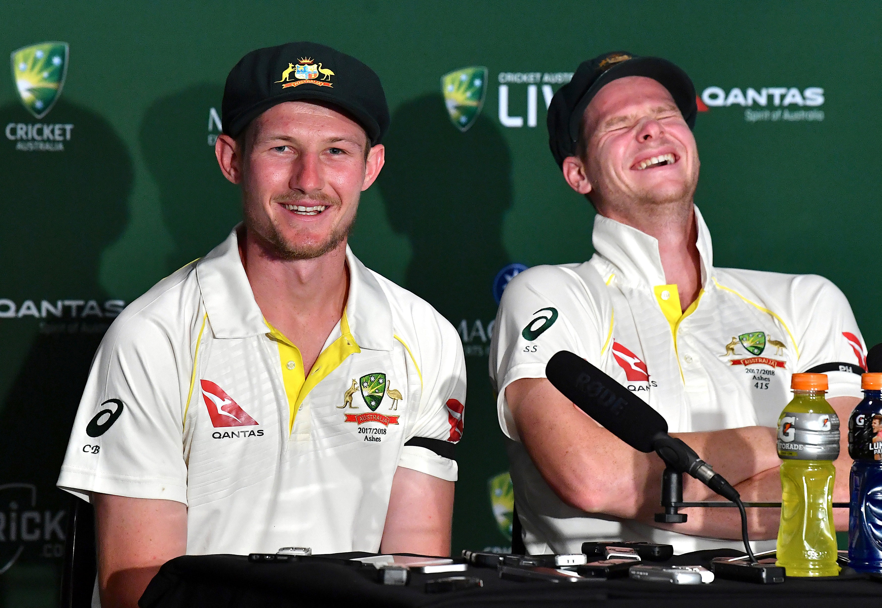 Australia’s captain Steve Smith (R) reacts as teammate Cameron Bancroft explains the alleged coming together between himself and England’s Jonny Bairstow. Photo: Reuters