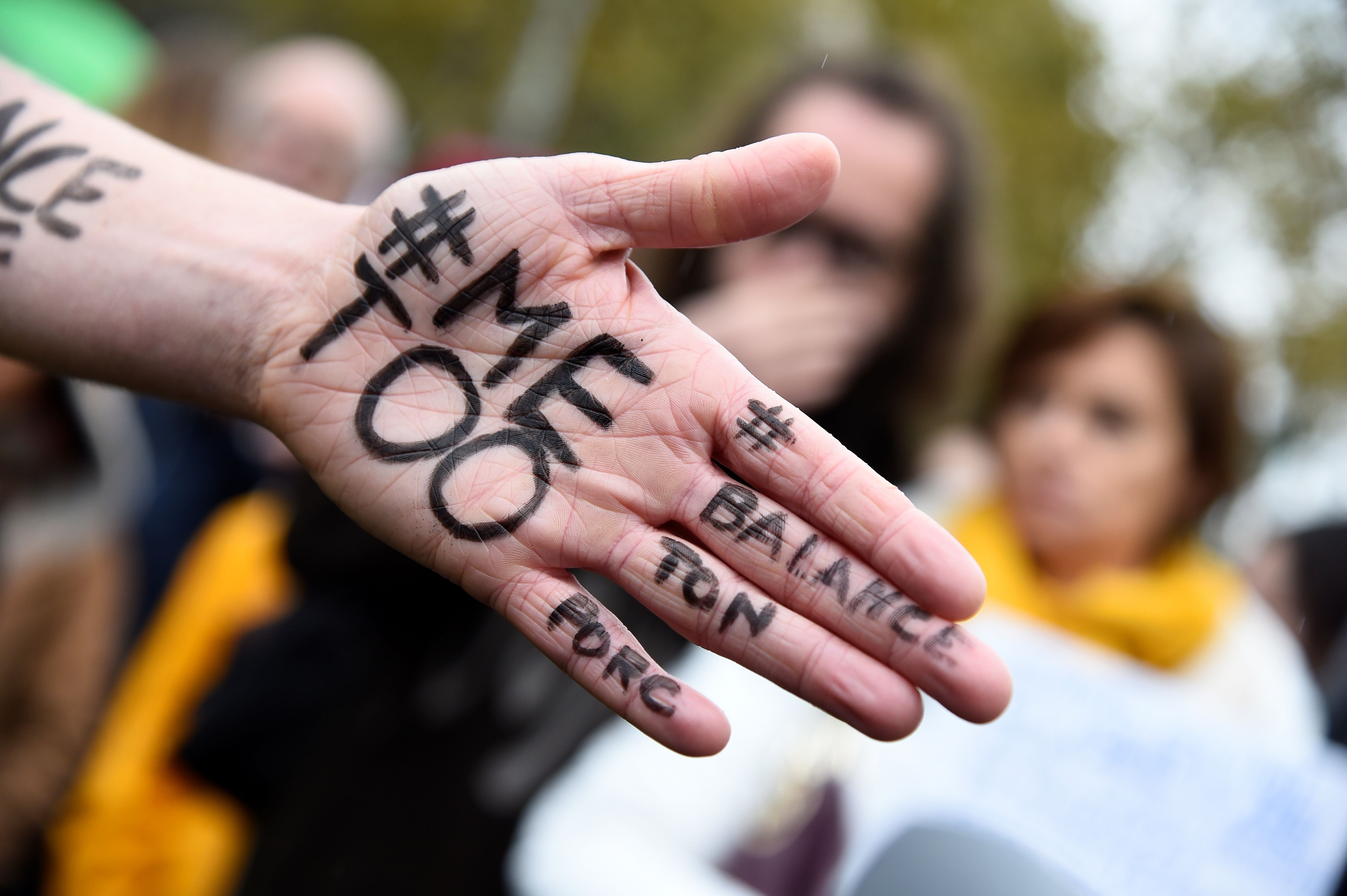 A protester displays the message at a gathering against gender-based and sexual violence, in Paris on October 29, as part of the global “#MeToo” campaign. Photo: AFP
