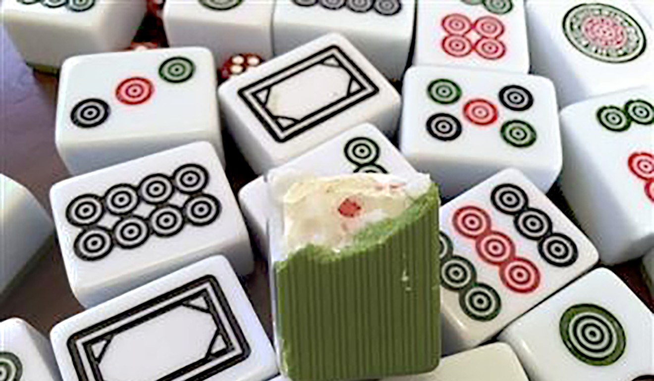Another gambler smashed open tiles to reveal chips inside. Photo: Yangtse Evening Post