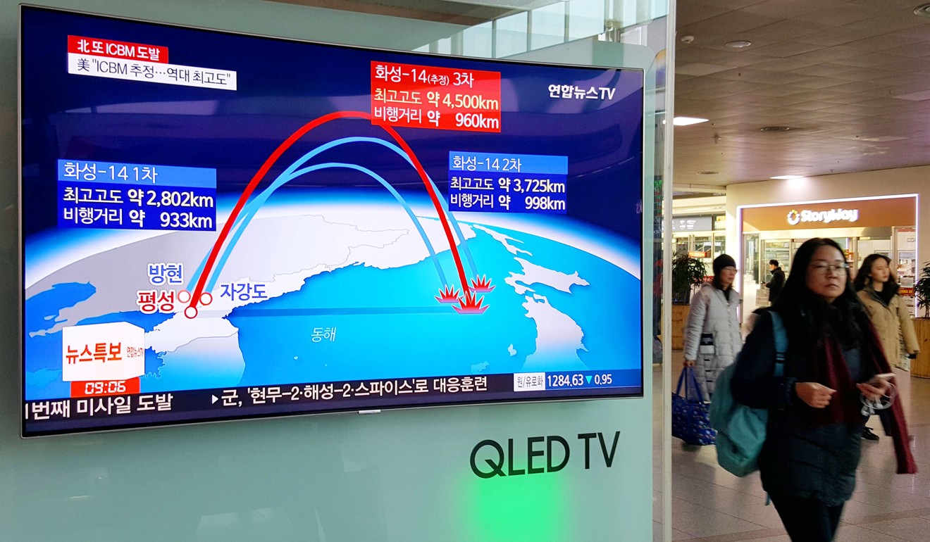 A TV screen at Seoul Station reports that North Korea has tested an intercontinental ballistic missile it says can hit the US mainland. Photo: Kyodo