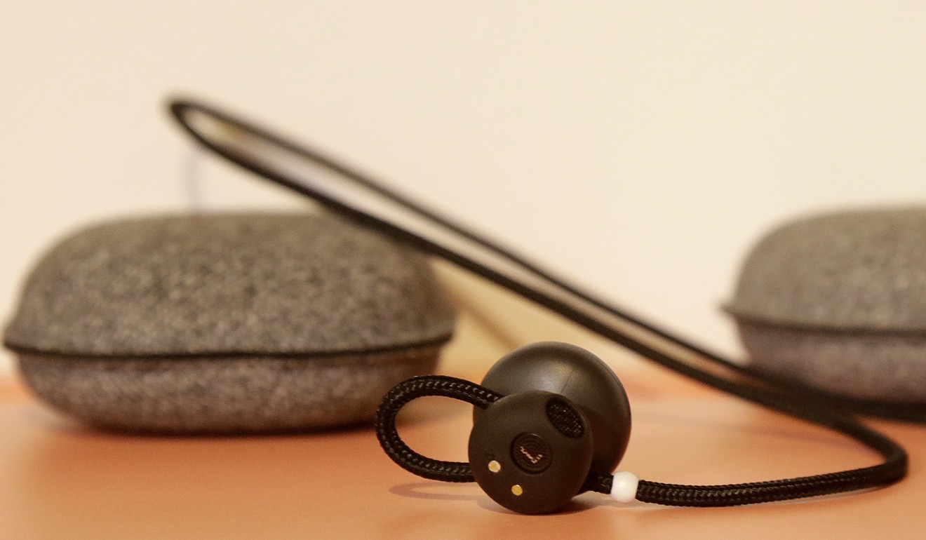Google Pixel Buds on display at a Google event. Photo: AP