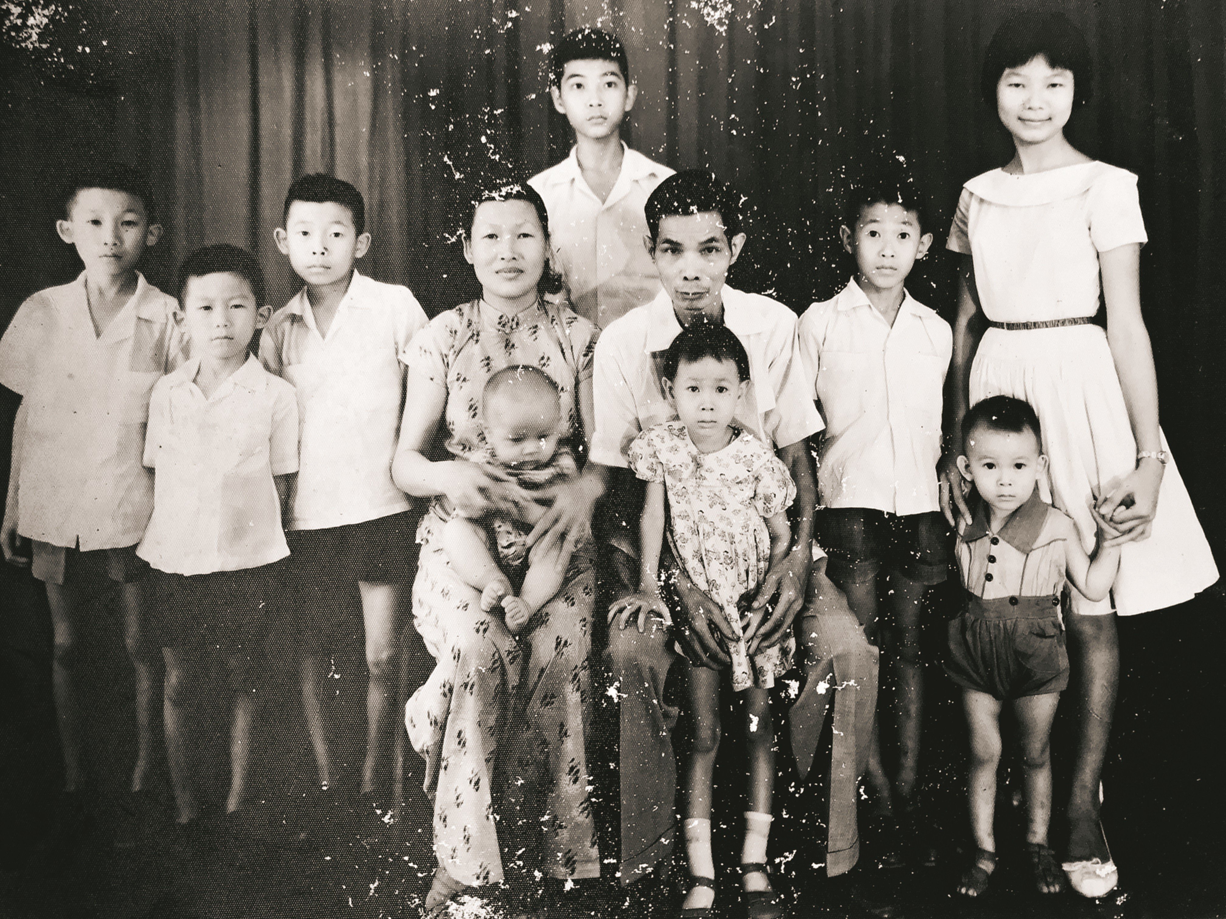 Wong Se Kong, since renamed Surya Widianto Wong, sits on his mother’s lap in this family photo from 1961. Photo: Stanley Widianto