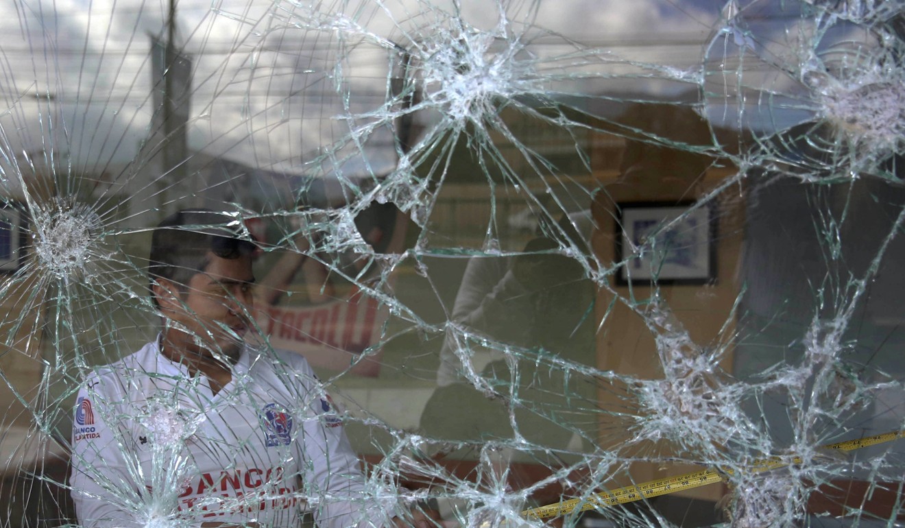 Protesters damaged property, set fires and looted businesses in the wake of the Honduras presidential election. Photo: EPA
