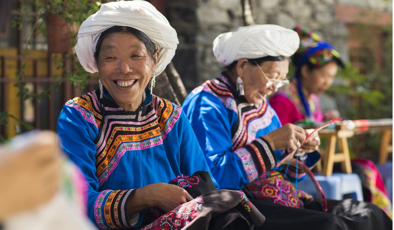 Women work on embroidery in Qiangfeng village in Wenchuan, Sichuan. Photo: Handout