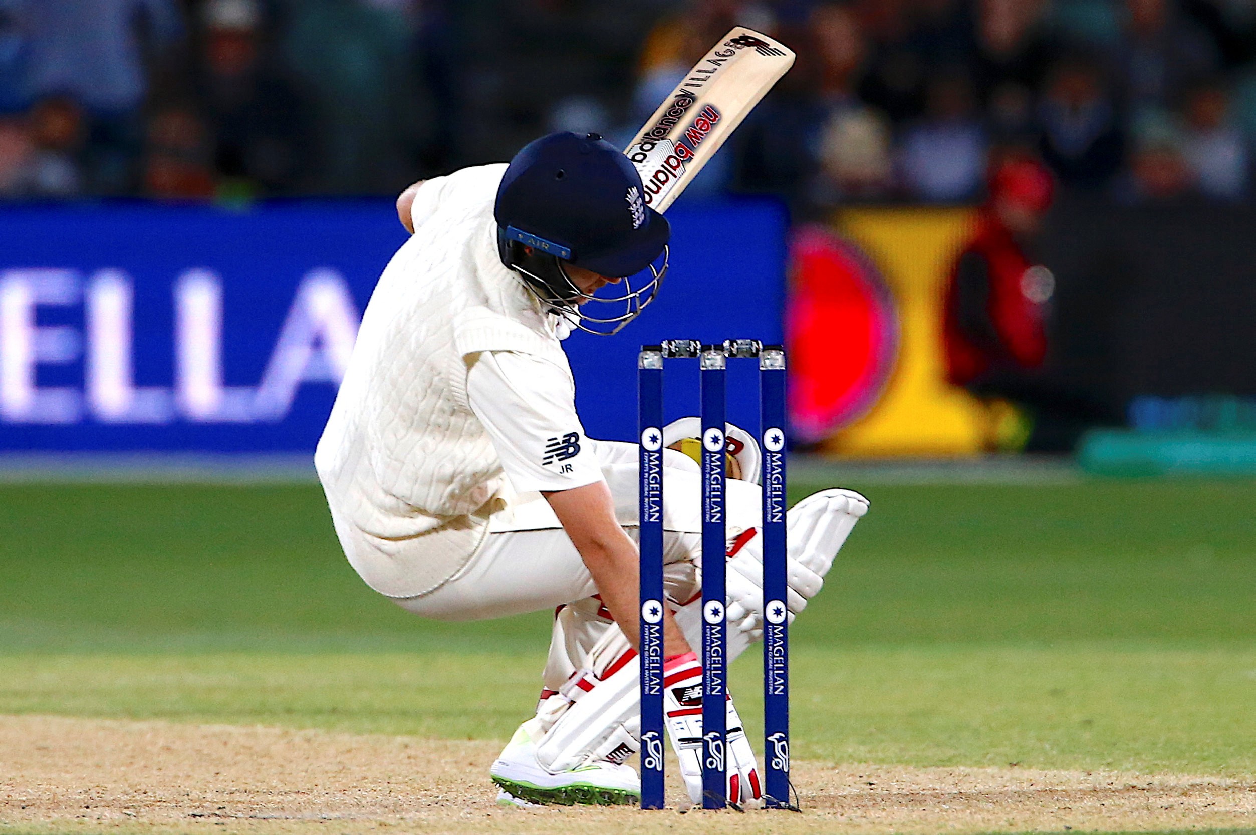 England skipper Joe Root avoids a bouncer from Australia's Josh Hazlewood on his way to 67 not out in the fourth day of the second Ashes test. Photo: Reuters