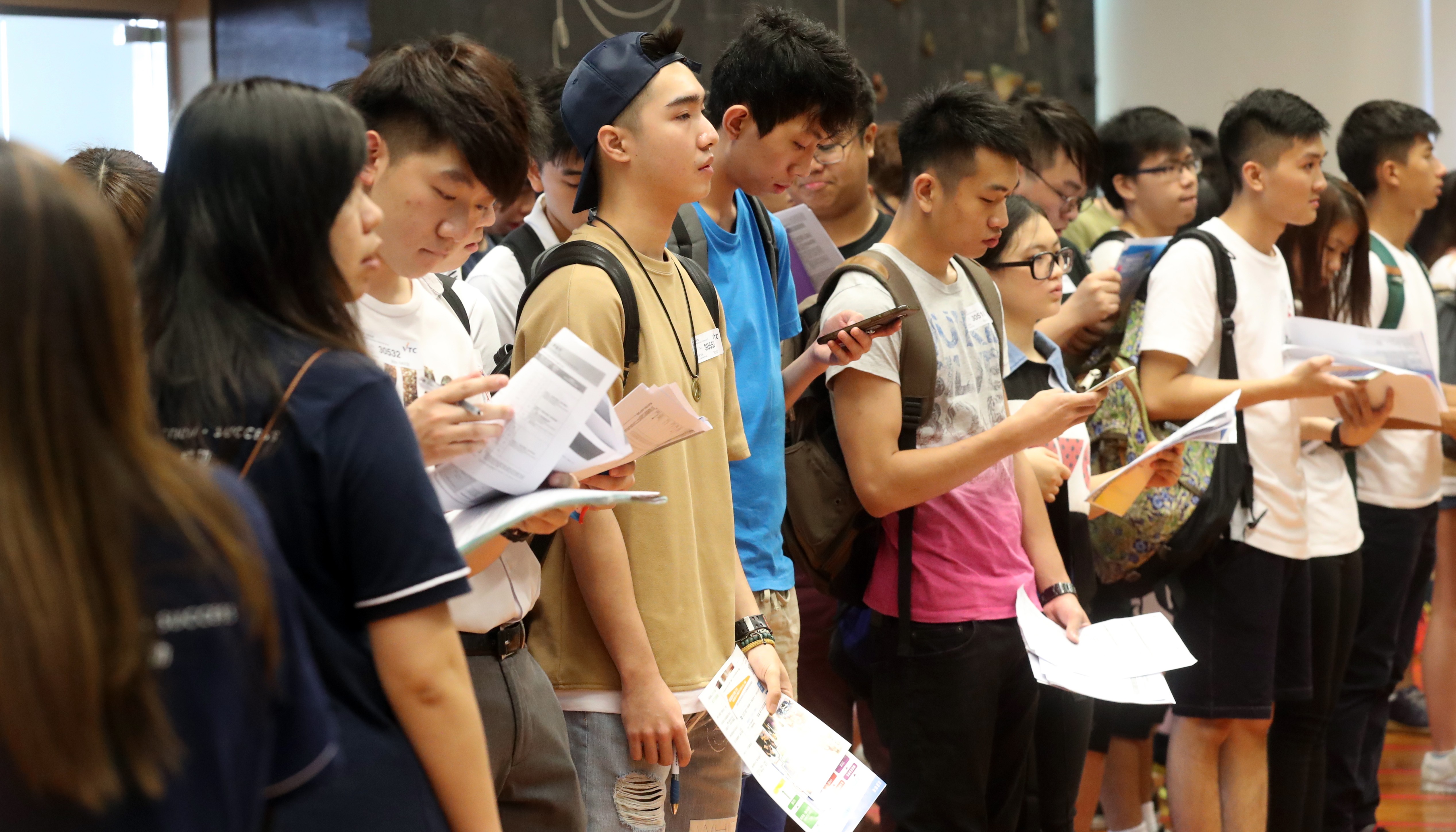 Students register for courses at the Vocational Training Centre's Institute for Vocational Education campus in Cheung Sha Wan. Photo: Edward Wong.