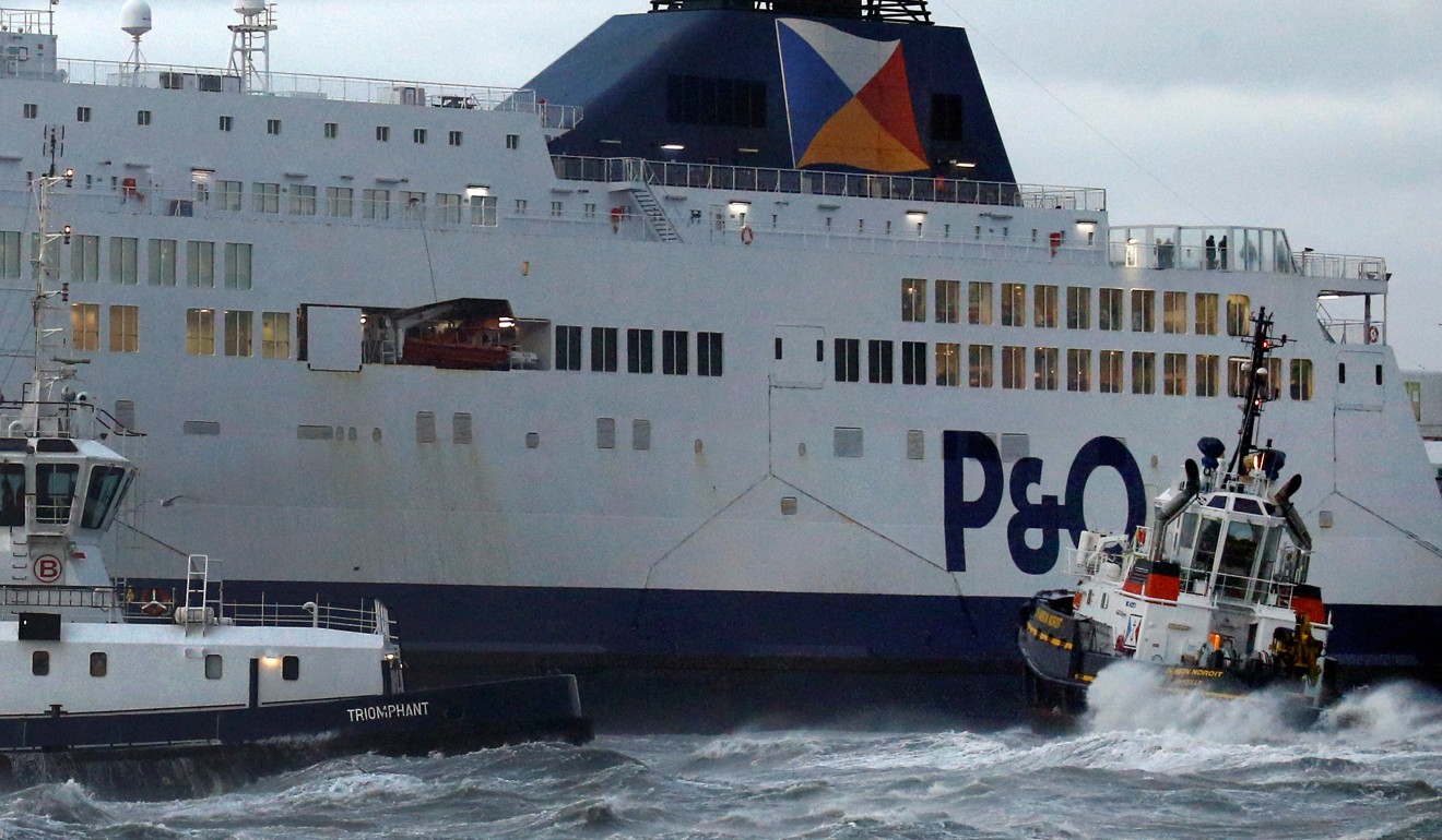Tugboats manoeuvre the P&O ferry Pride of Kent after it ran aground in the port of Calais in France. Photo: Reuters