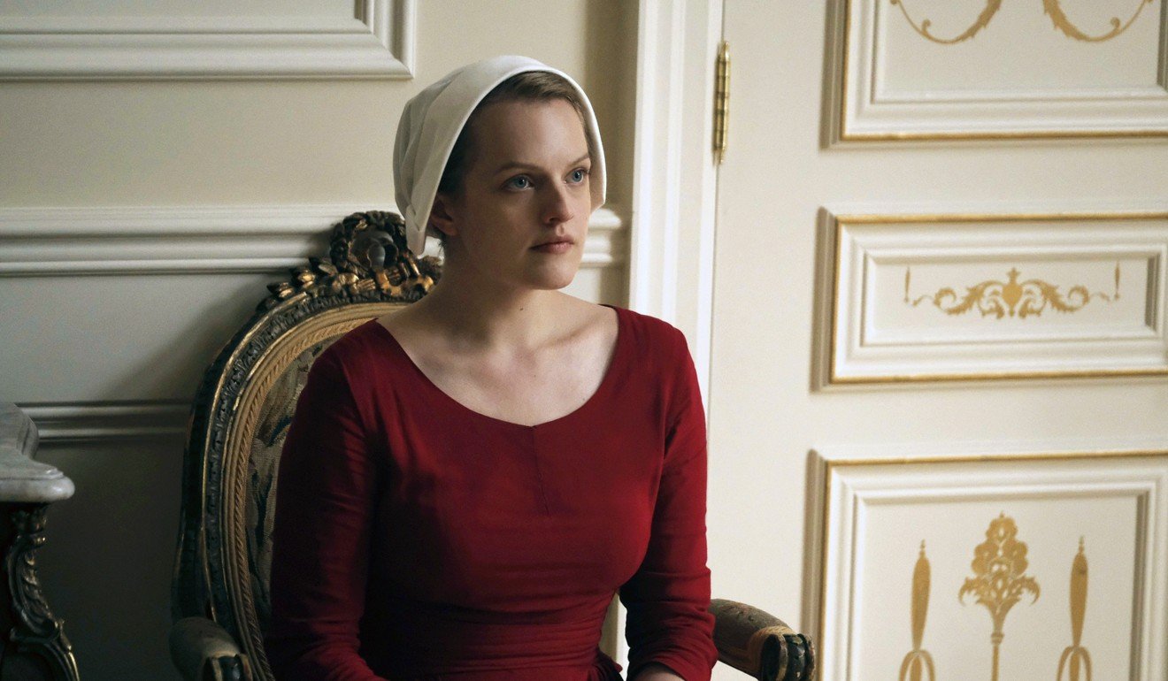 This image released by Hulu shows Elisabeth Moss as Offred in a scene from, The Handmaid's Tale. Moss was nominated for a Golden Globe award for best actress in a drama series or motion picture made for TV on Monday. Photo: AP
