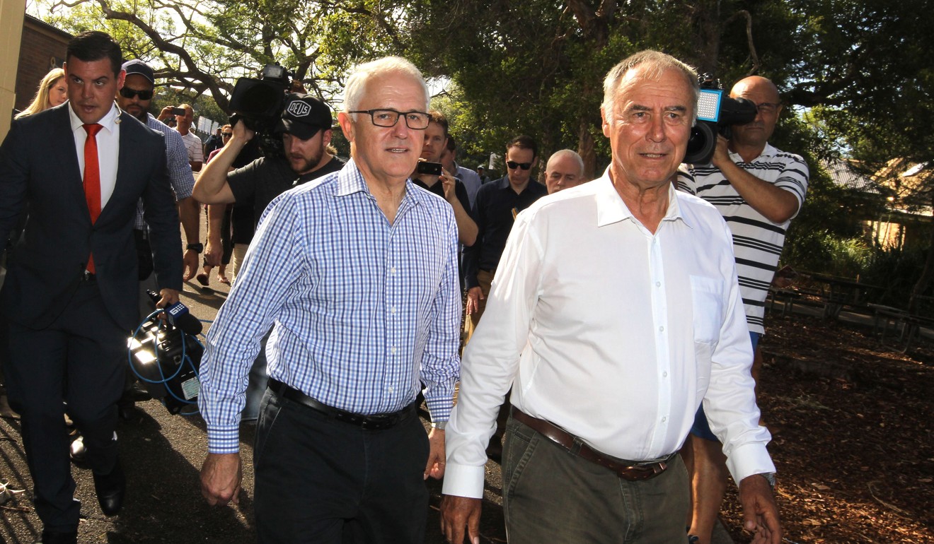 Liberal candidate for Bennelong John Alexander with Australian Prime Minister Malcolm Turnbull in Sydney. Photo: EPA