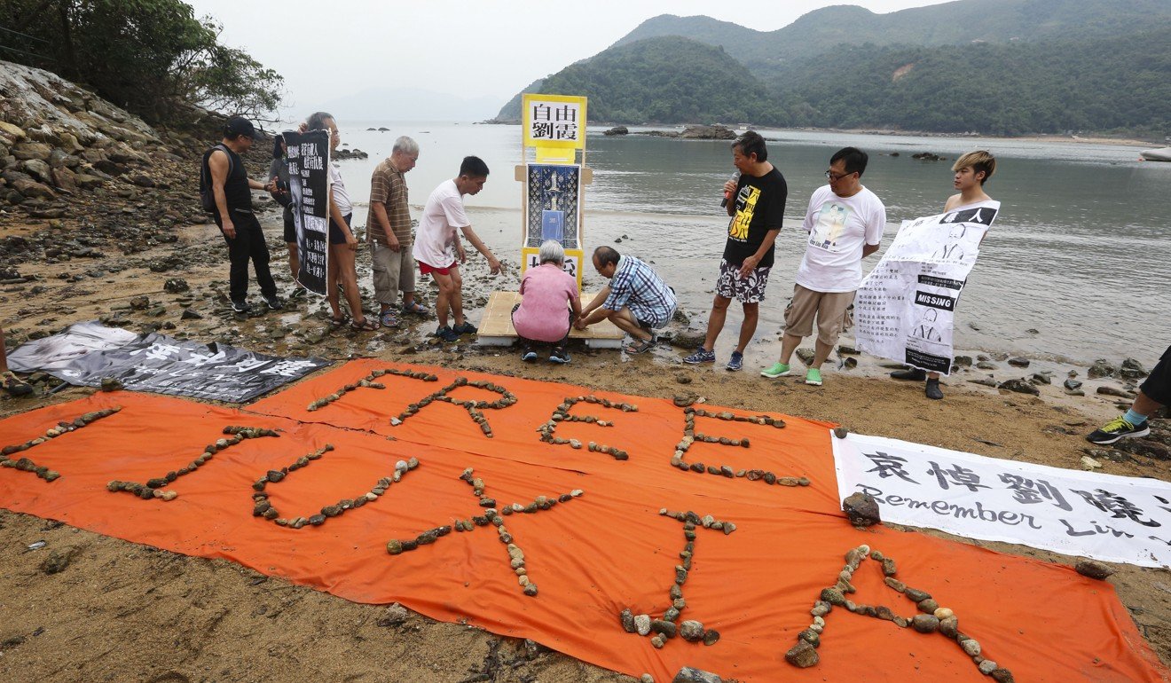 The Hong Kong Alliance in Support of Patriotic Democratic Movements of China holds a seaside memorial for Liu Xiaobo in Sai Kung. Photo: David Wong
