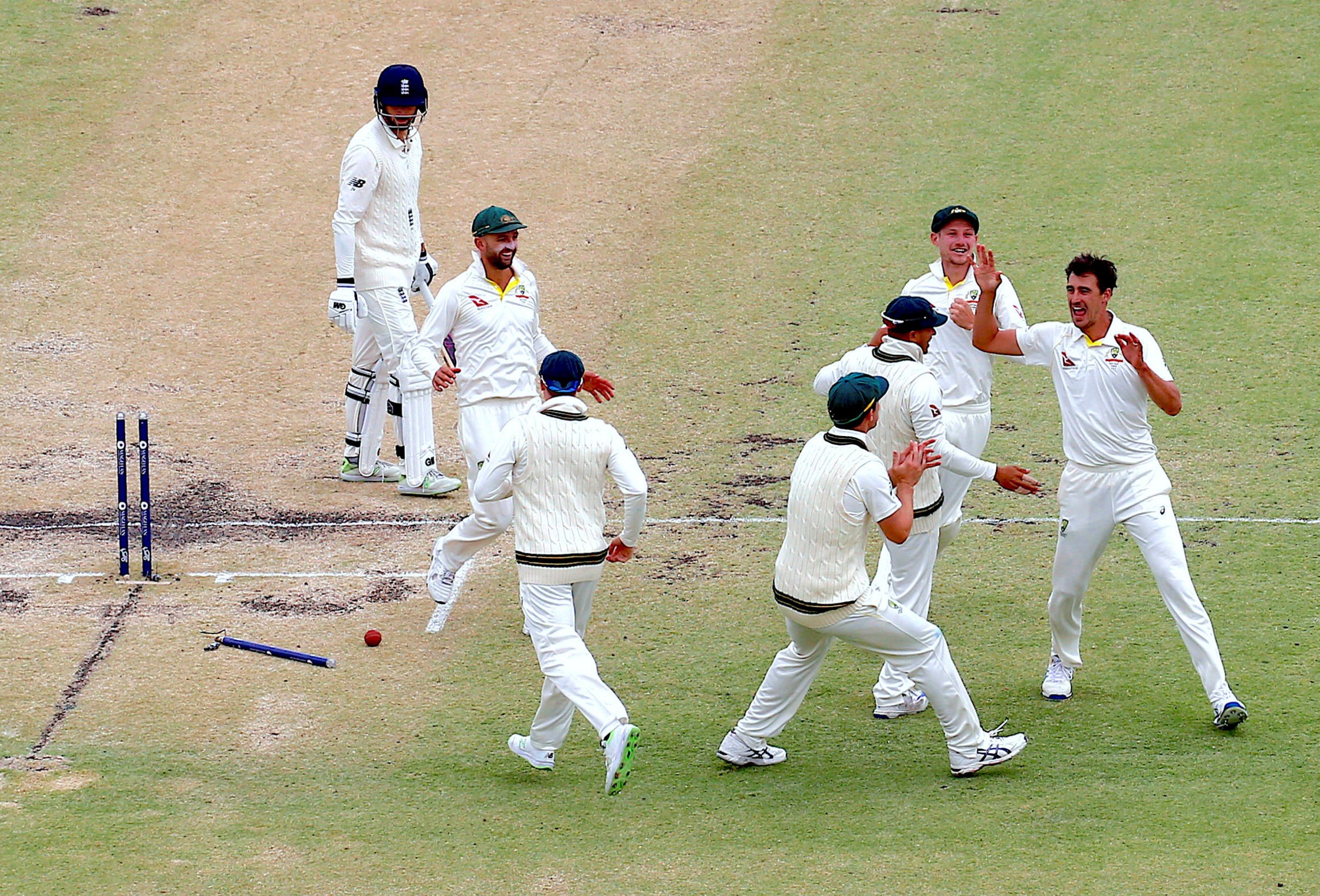 Australia's Mitchell Starc celebrates after bowling England's James Vince. Photo: Reuters
