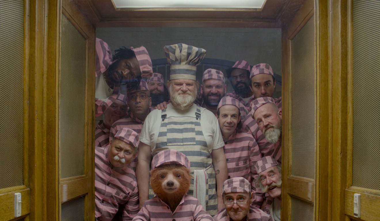 The bear and some of his new friends in a still from Paddington 2.