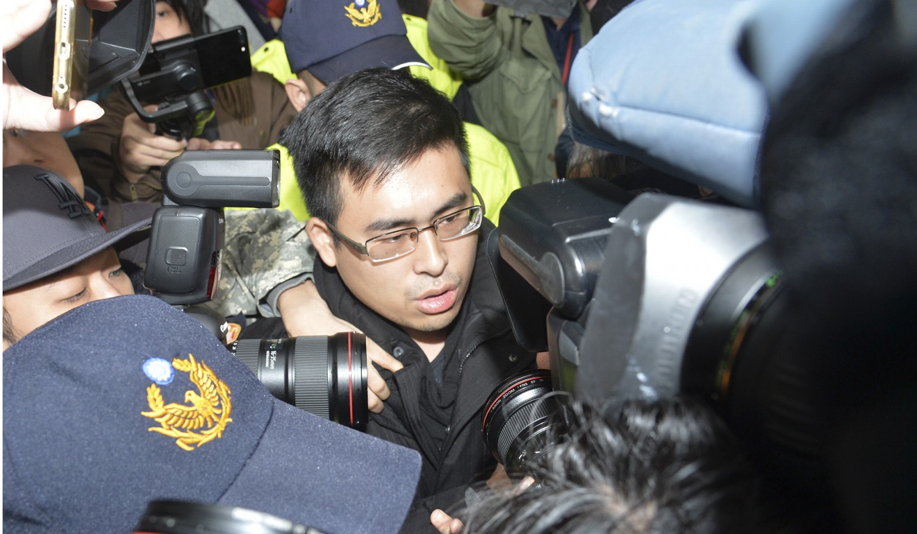 New Party spokesman Wang Ping-chung is taken in for questioning in Taiwan. Photo: CNA