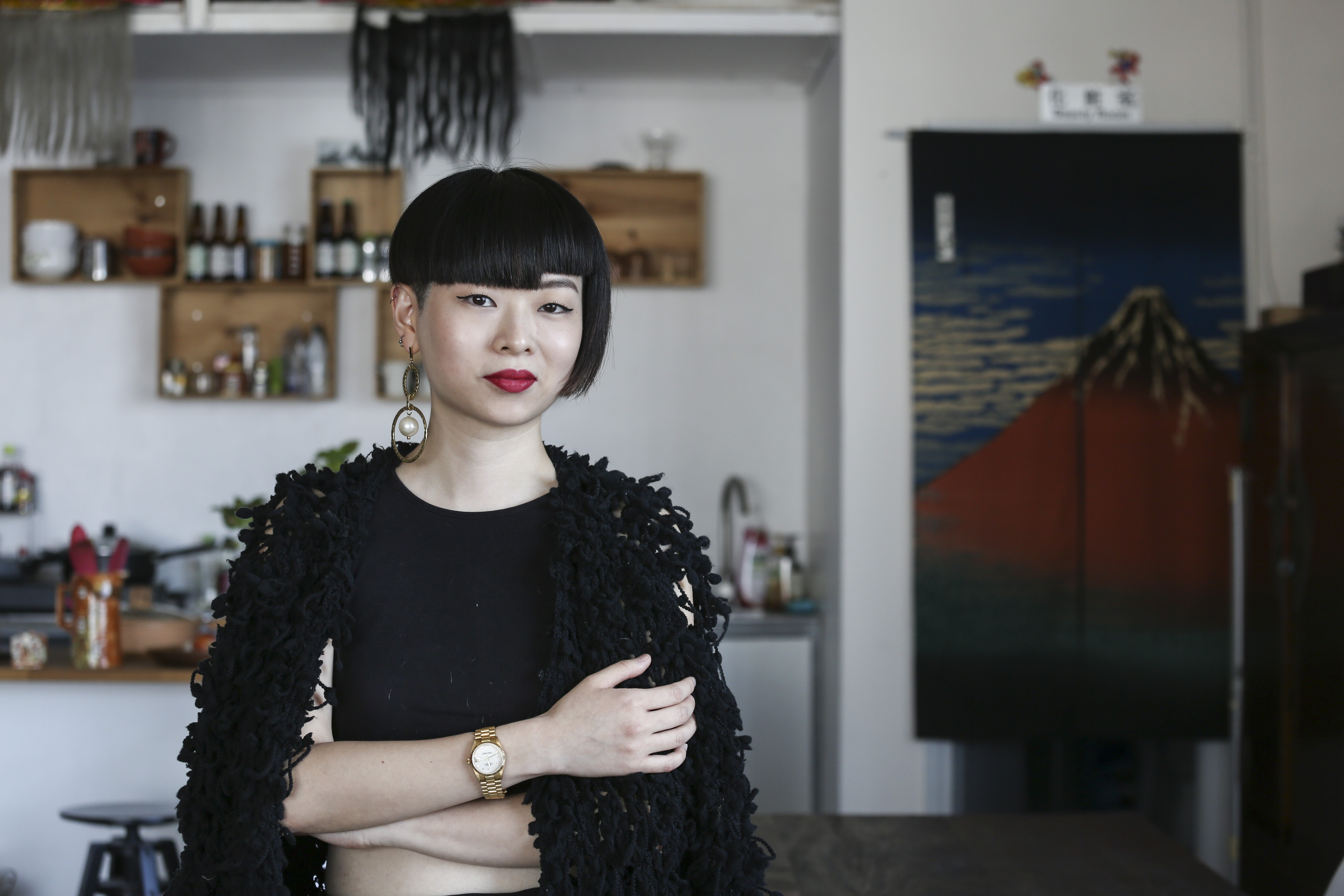 Thierry Chow, a feng shui practitioner, at her home in Chai Wan. Photo: SCMP / Jonathan Wong