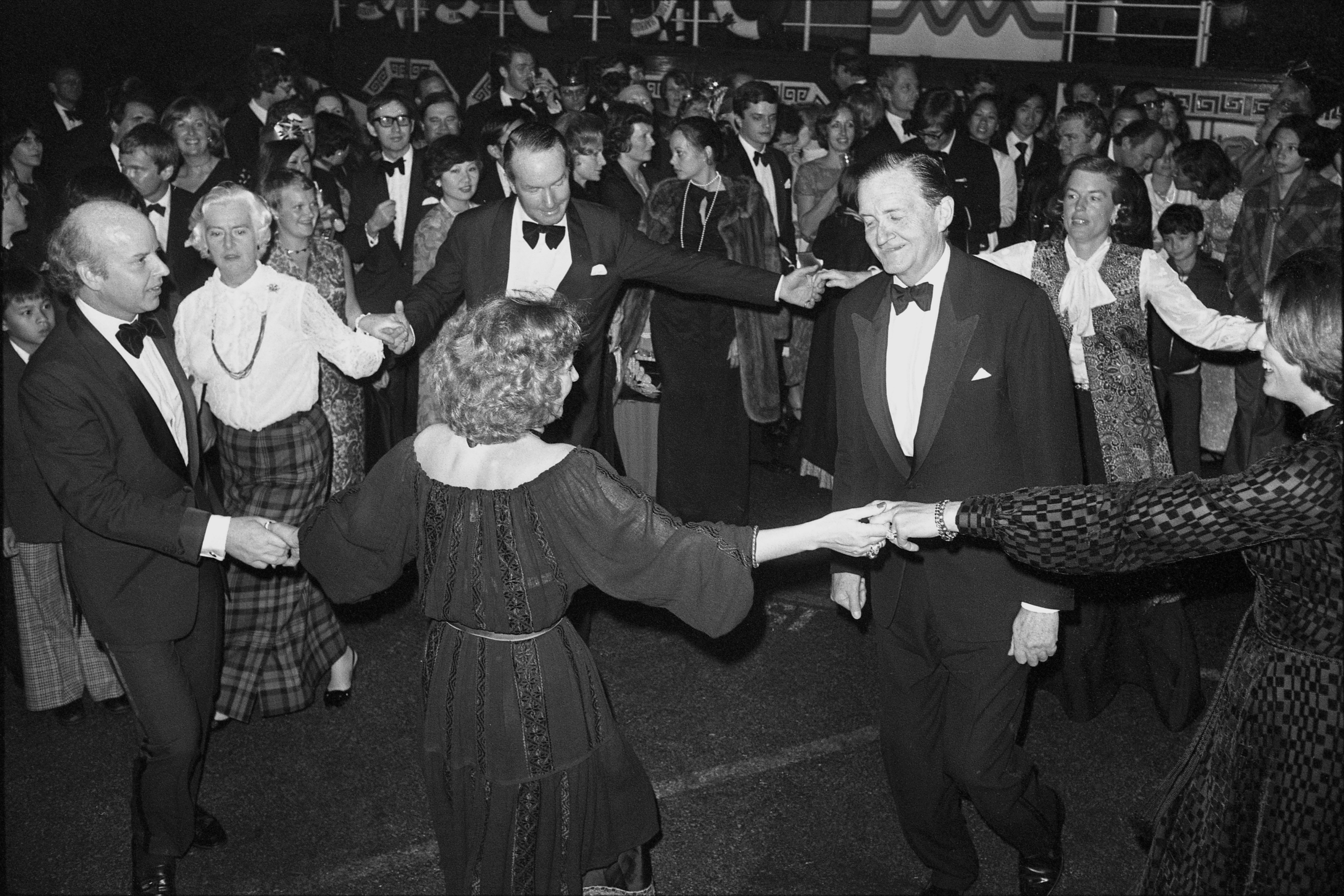 They don’t see in the new year in Hong Kong like this any more, do they? Hong Kong Governor Sir Murray MacLehose (right) becomes the focus of a dancing ring at Jardine Matheson’s New Year's Eve ball in 1977. Photo: SCMP