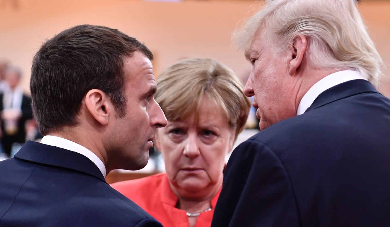 French President Emmanuel Macron, German Chancellor Angela Merkel and US President Donald Trump chat at the start of the first working session of the G20 meeting in Hamburg, Germany in July. Germany and France are among the close US allies whose appreciation for America has declined under Trump. Photo: AFP