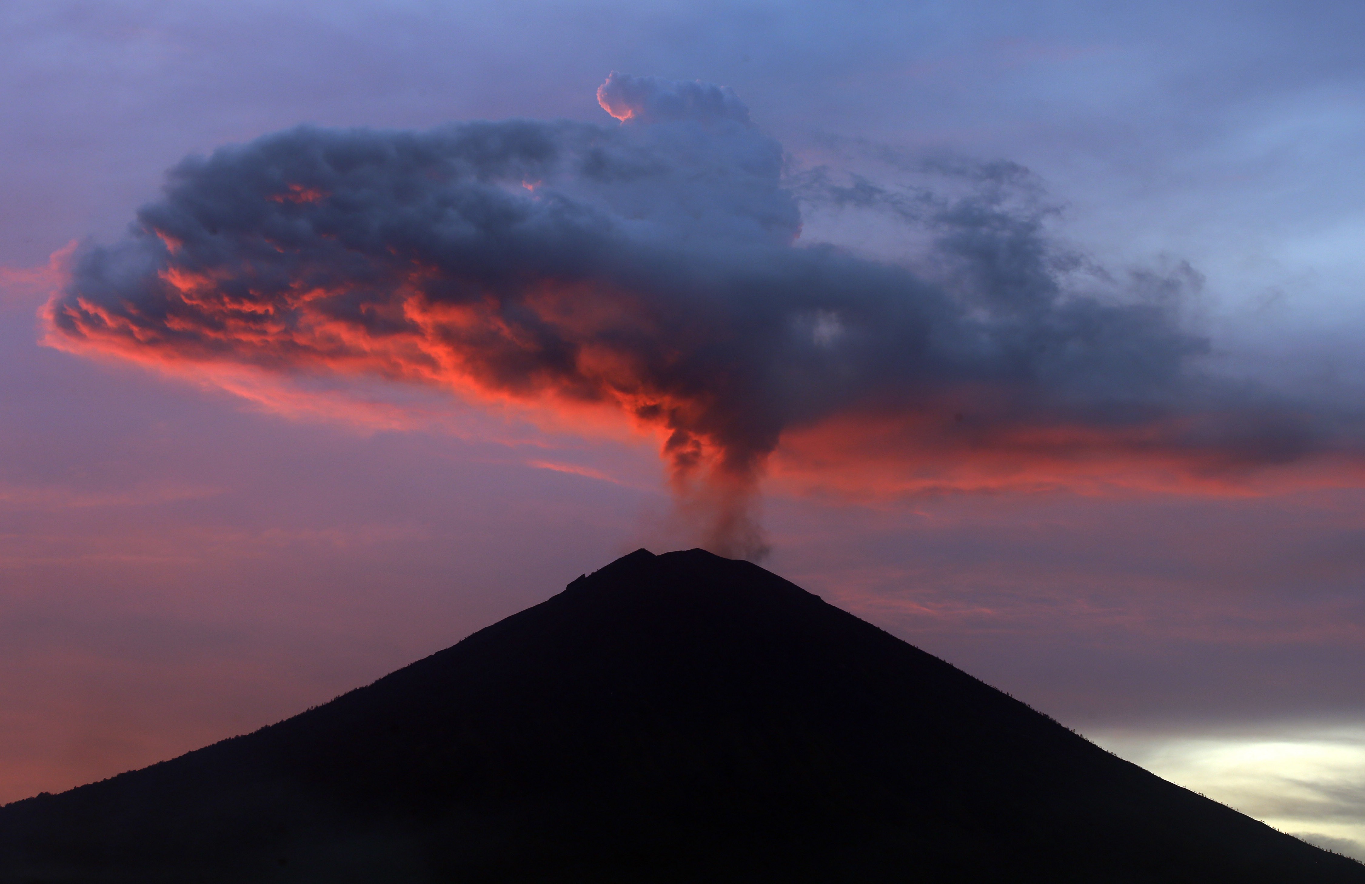 Though it has yet to yield a major eruption, Mount Agung still has tens of thousands displaced and is scaring away visitors who fear getting stuck by flight cancellations after their end-of-the-year celebrations