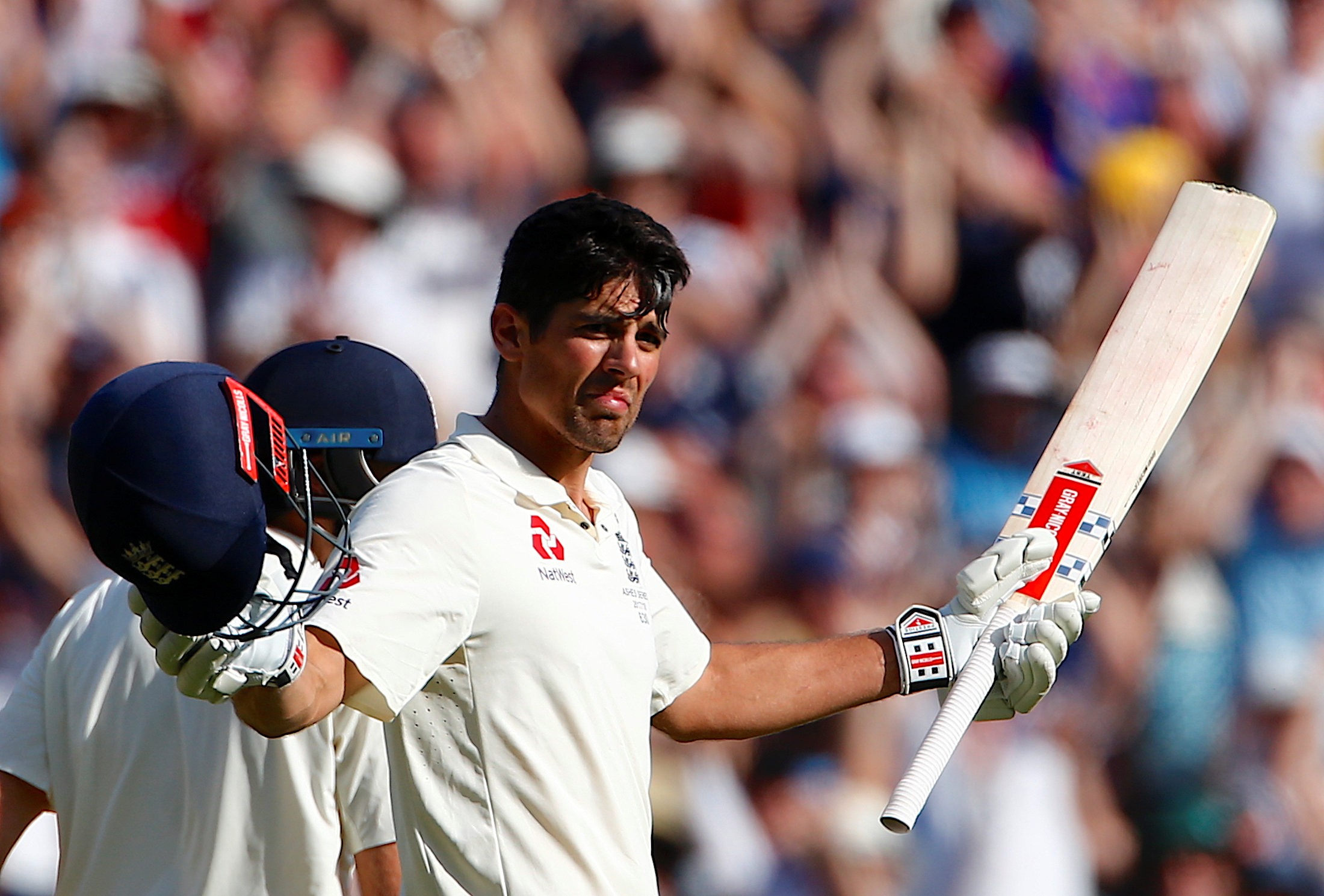 England's Alastair Cook celebrates after making his century during the second day of the fourth Ashes test. Photo: Reuters