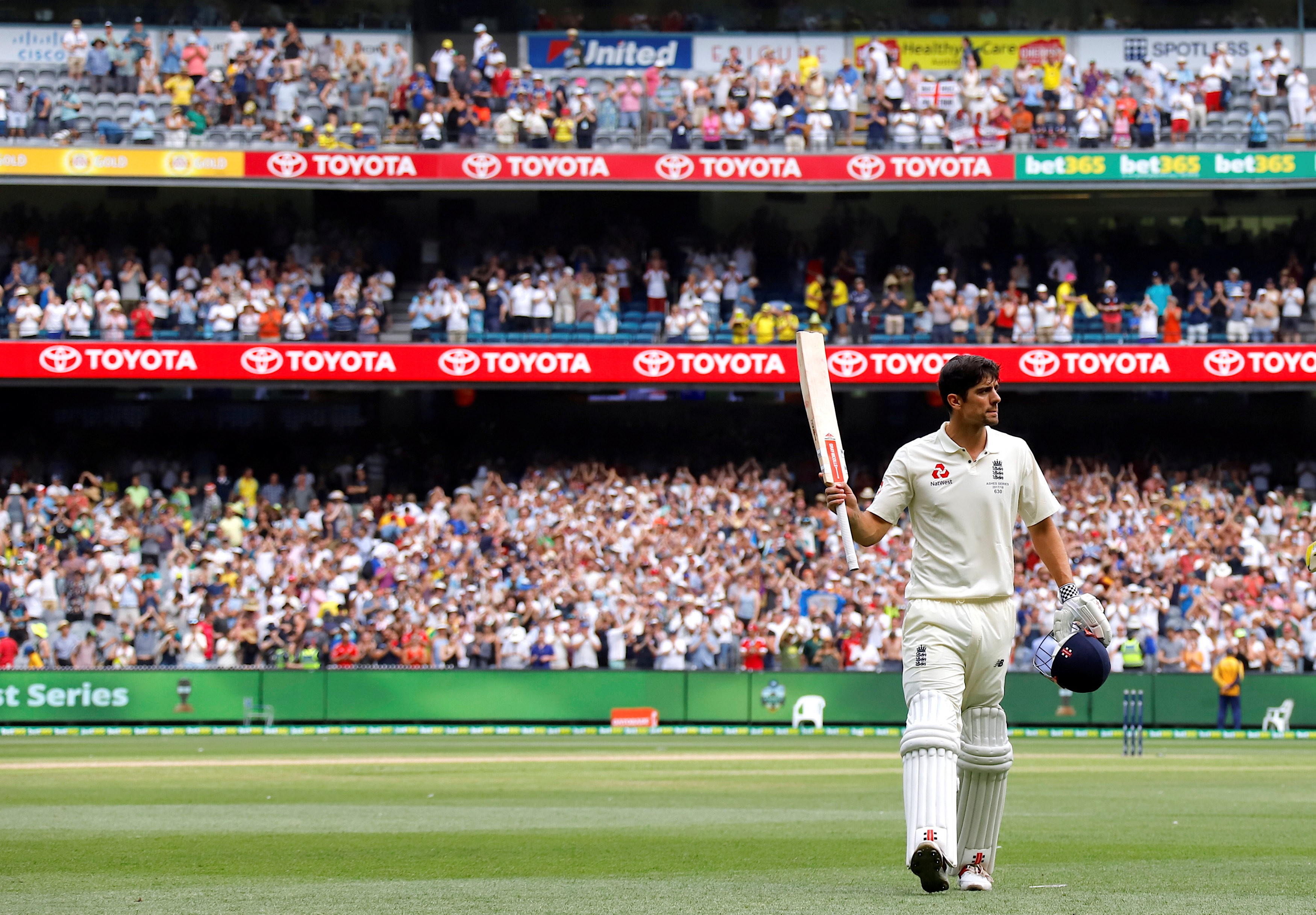England's Alastair Cook acknowledges the crowd as he walks off the ground at the end of the third day of the fourth Ashes test. Photo: Reuters