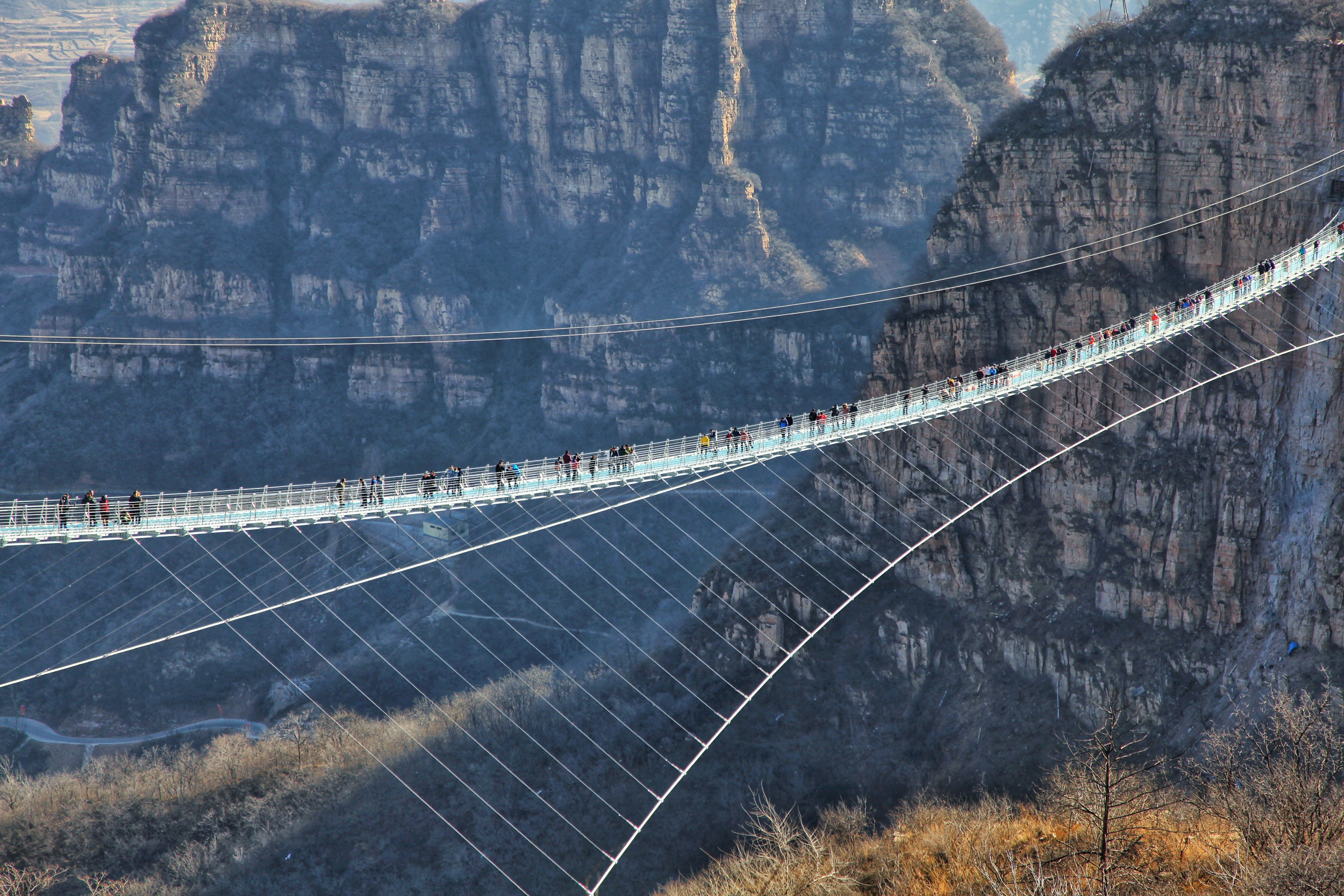 The glass suspension bridge at Hongyagu Scenic Area in Pingshan county, Hebei province. Photo: Xinhua