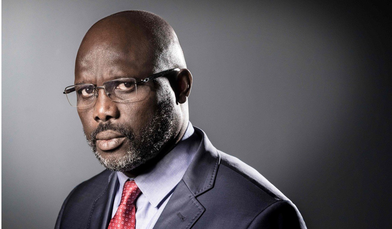 In this file photo taken on September 25, 2017, former football player and candidate in Liberia’s presidential elections George Weah poses during a photo session in Paris. Photo: Agence France-Presse