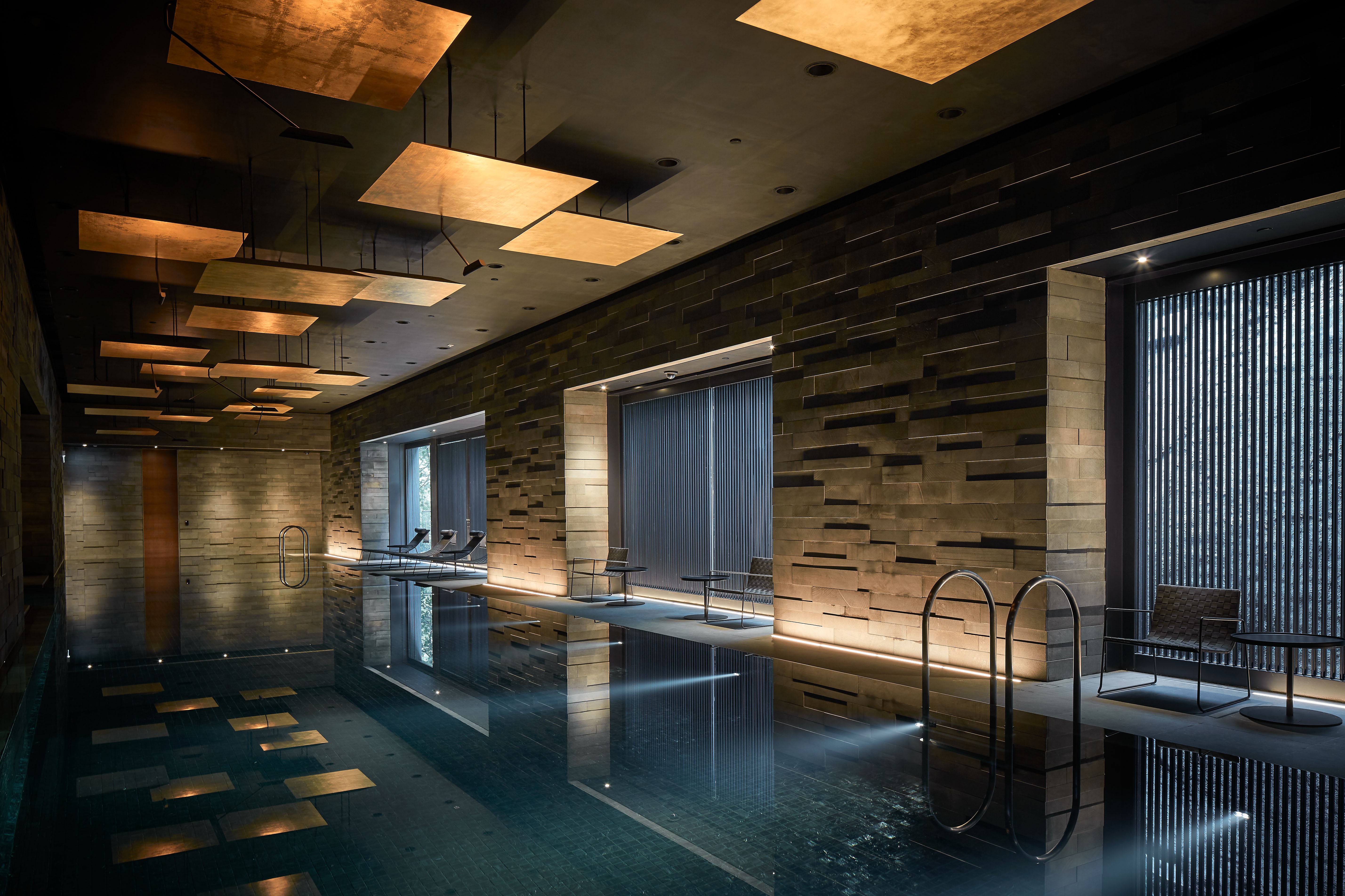 Interior designer Koichiro Ikebuchi designed a swimming pool inspired by Japan’s onsen for the clubhouse of the Pavilia Hill residential development in Tin Hau, Hong Kong.