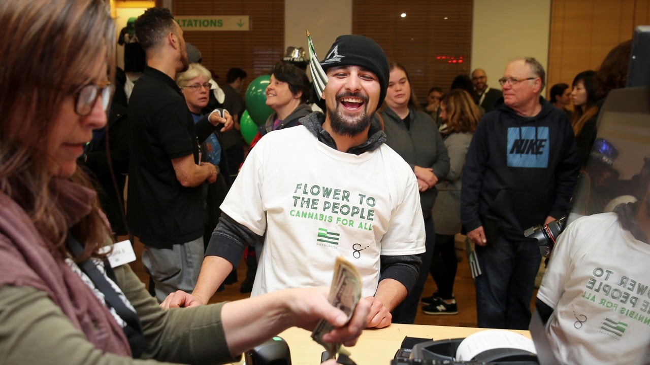 Michael Sherman purchases marijuana at Harborside. Photo: Reuters