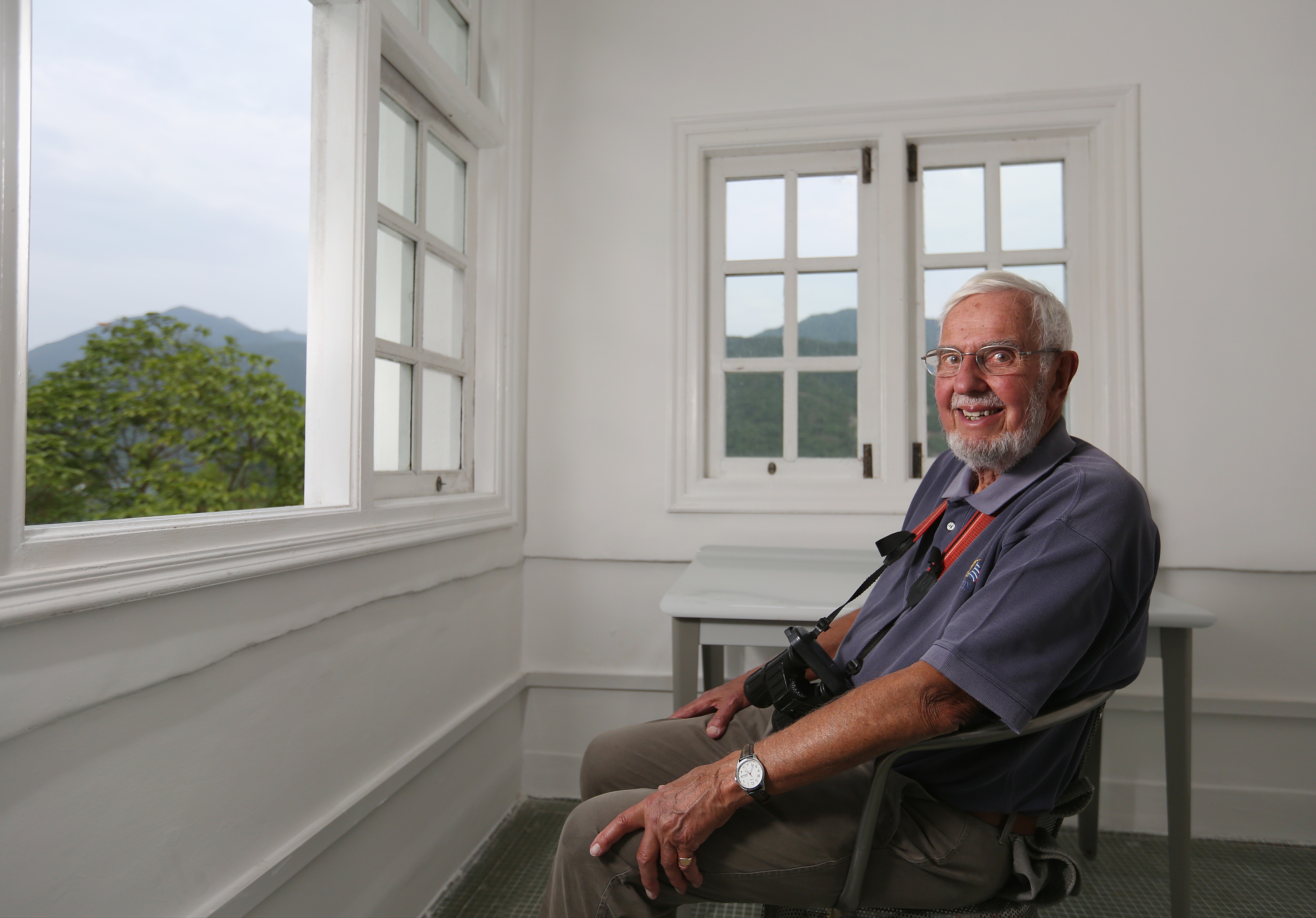 Dr Jim Flegg, ornithologist who was guest of honour at recent eco-education event, steps inside his former Hong Kong home for the first time since he was a child and wartime evacuation to Australia heralded a life steeped in nature