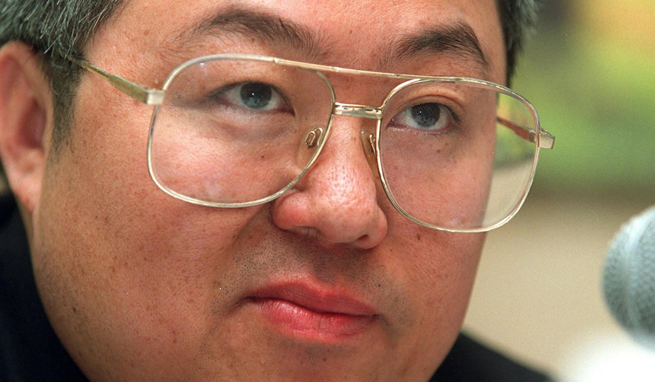 Gu Chujun, founder of Greencool Technology Holdings, at a press conference on March 28, 2001.