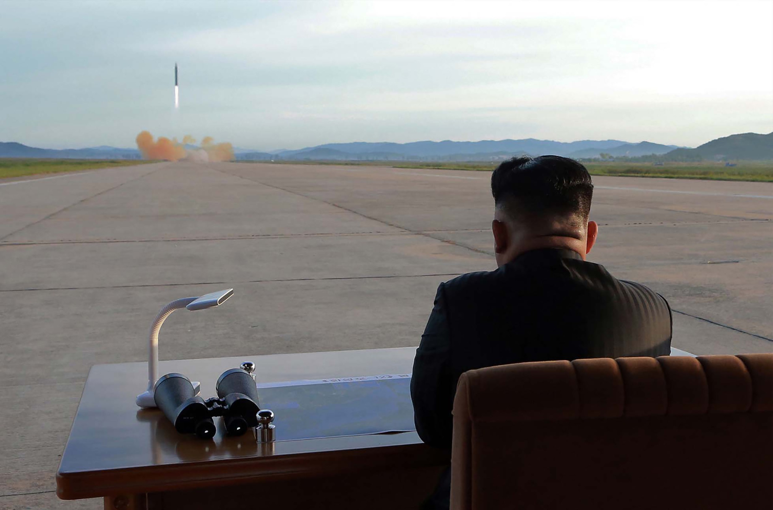 North Korean leader Kim Jong-un watches a launch drill of the strategic ballistic rocket Hwasong-12 in a photo released by Korean Central News in September 2017. Photo: KCNA via AFP