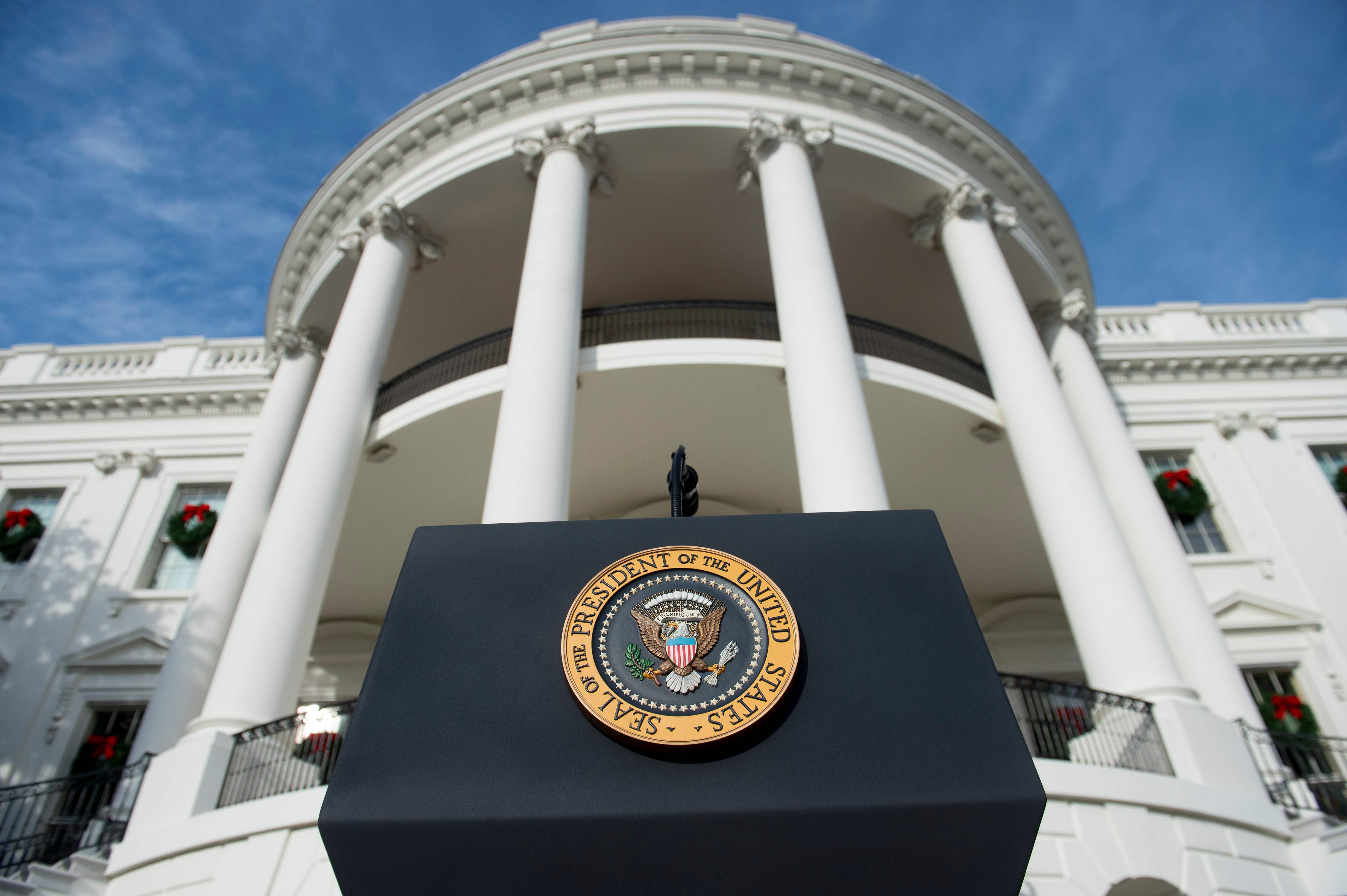 The US Presidential Seal on the podium before President Donald Trump speaking about the passage of tax reform legislation on the South Lawn of the White House in December. Photo: Reuters