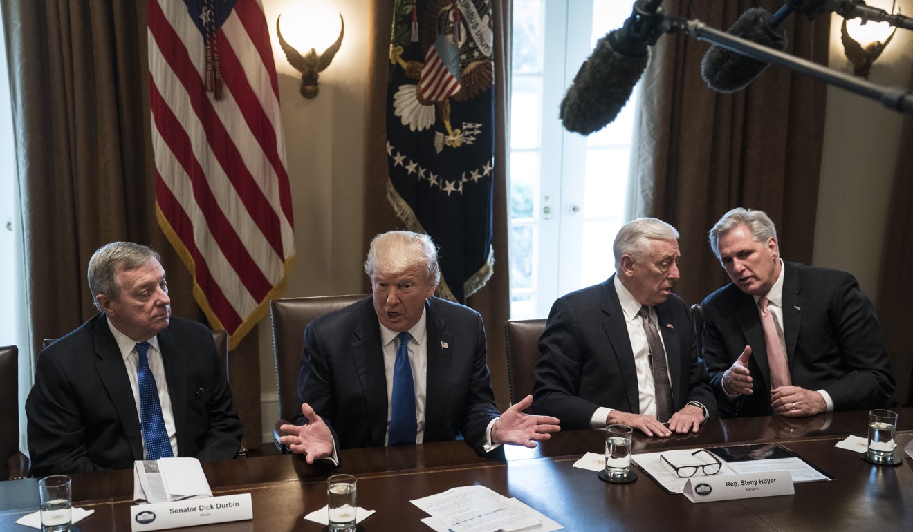 Senator Dick Durbin, US President Donald Trump, Representative Steny Hoyer, and Representative Kevin McCarthy talk during a meeting with lawmakers on immigration policy at the White House on Tuesday. Photo: Washington Post