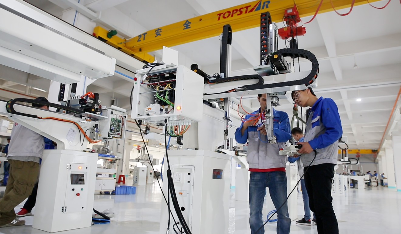 A robotic arm assembly line at Guangdong Topstar Technology in Dongguan. Photo: Thomas Yau