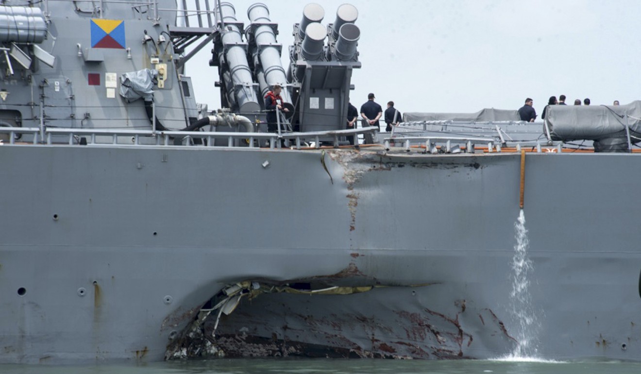 This August 21, 2017, photo shows damage to the guided-missile destroyer USS John S. McCain at Changi naval base in Singapore. Photo: AP