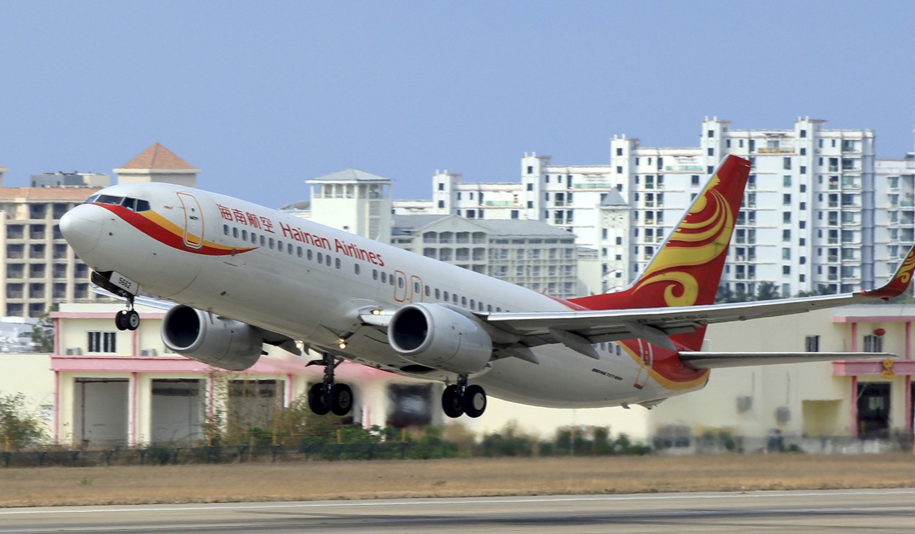 A Hainan Airlines plane takes off from the Sanya Phoenix International Airport in Hainan province. Photo: Reuters