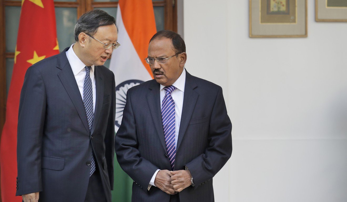 Indian National Security Adviser Ajit Doval (right) talks with Chinese State Councillor Yang Jiechi in New Delhi last month. Photo: AP