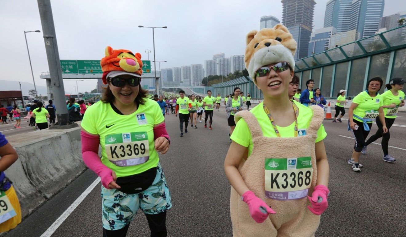 Two more costumed runners in the Hong Kong Marathon. Photo: Felix Wong