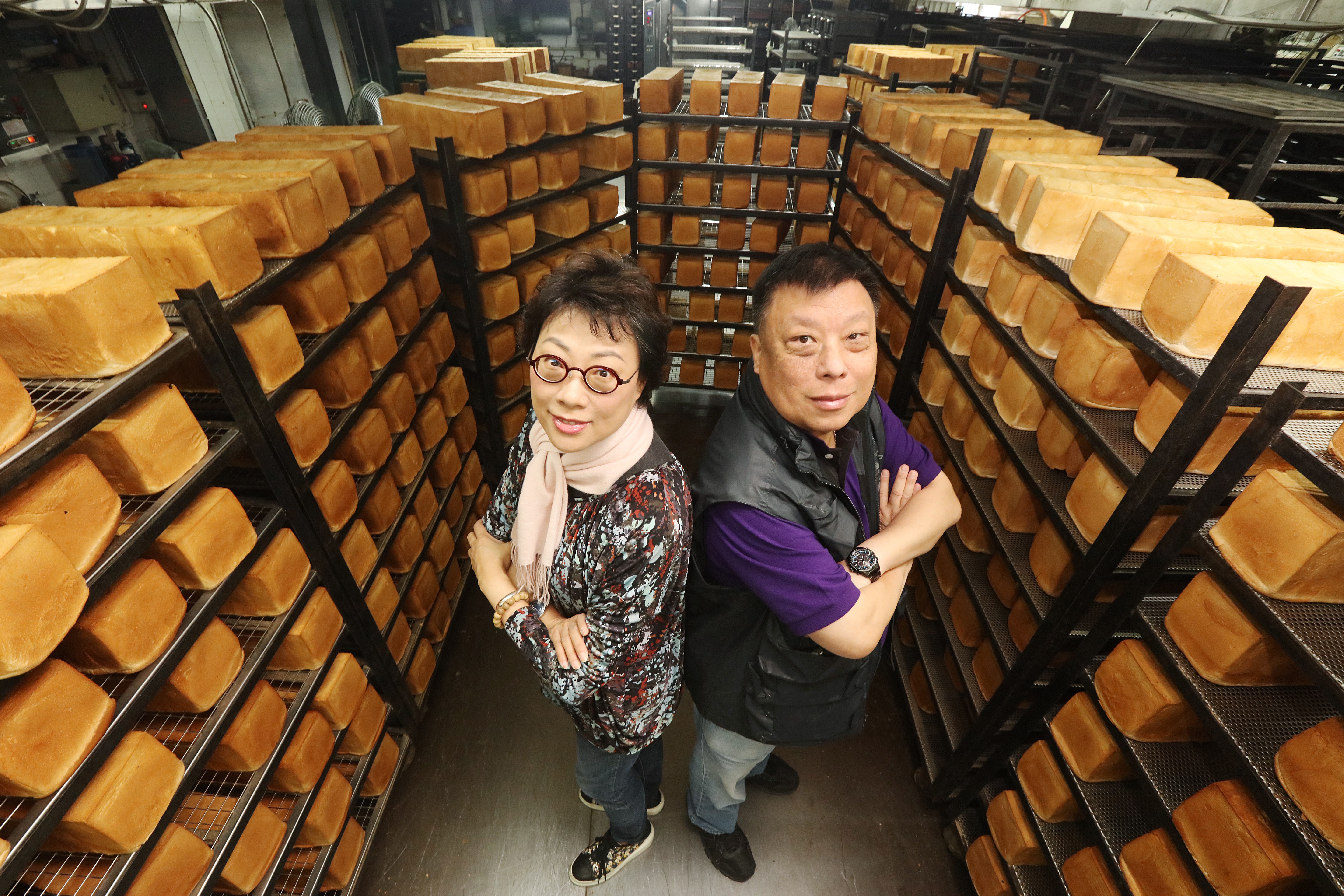Heung Heung Food Products’ executive director Peter Keung and his wife, Tammy, at the company’s baking facility in Wong Chuk Hang. Pictures: Felix Wong