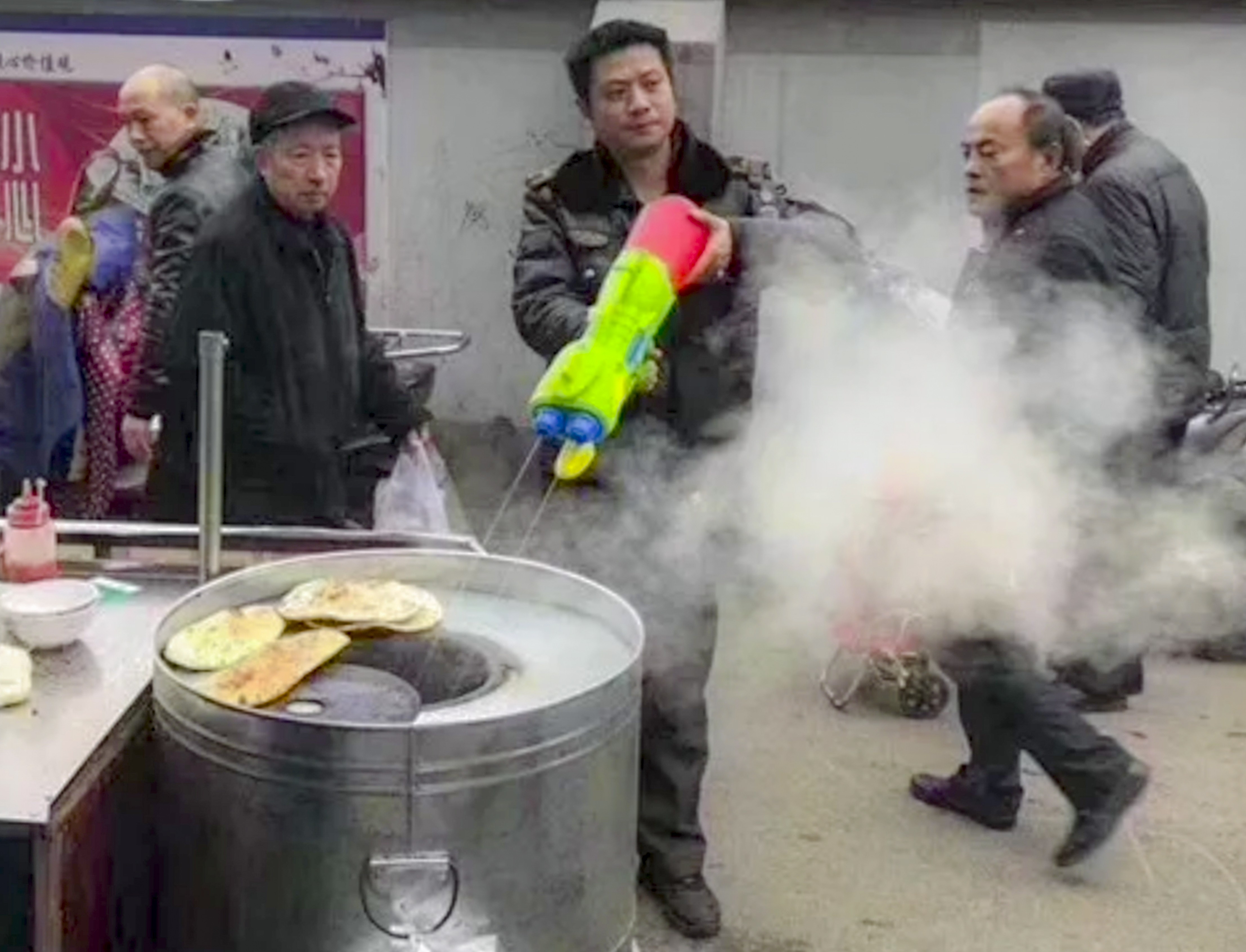 Enforcers used the super squirters to put out illegal fire. Photo: sina.com.cn