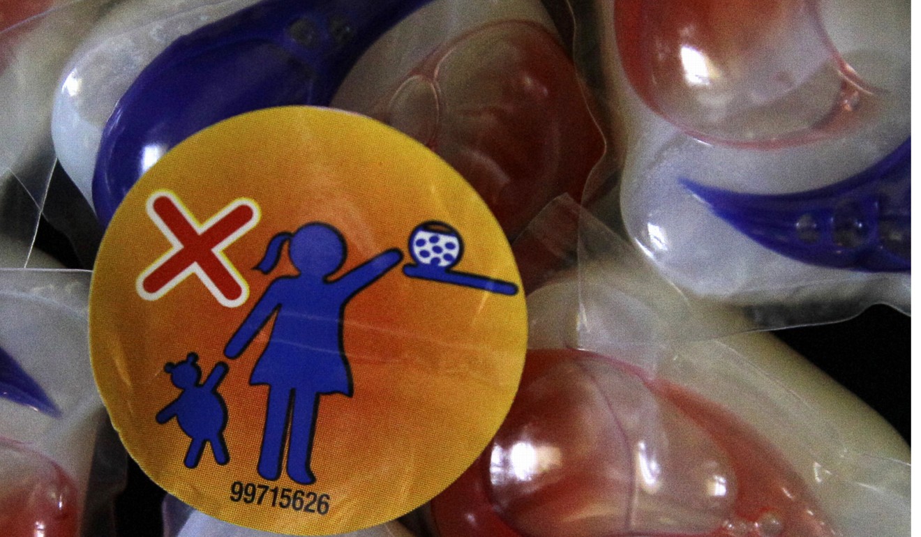 A warning label is attached to a package of Tide Pod laundry detergent packets. Photo: AP