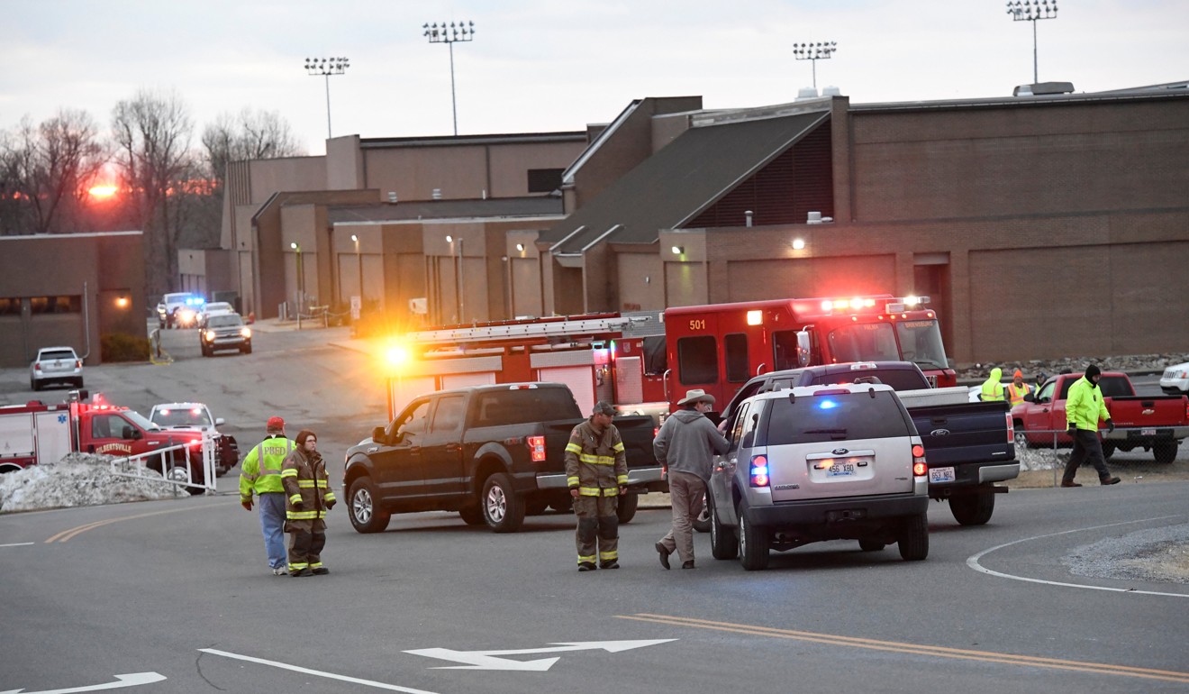 Police investigators are seen at the scene of a shooting at Marshall County High School in Benton, Kentucky, on Tuesday. Photo: Reuters