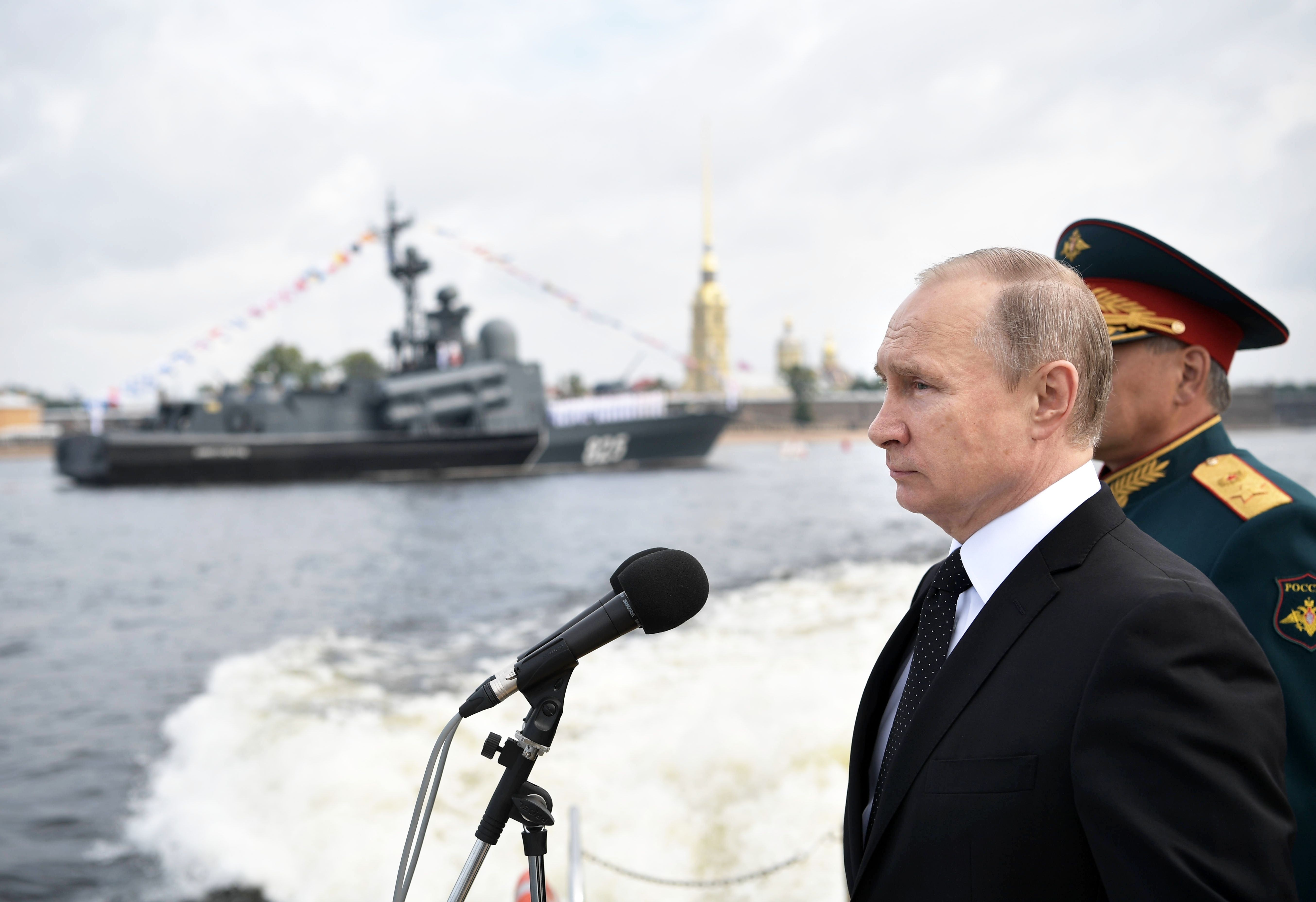 Russian President Vladimir Putin attends a ceremony for Russia's Navy Day in Saint Petersburg on July 30. The pomp-filled display of Russia's naval might celebrated the expansion of Russian sea power from the Baltic Sea to the shores of Syria. Photo: AFP