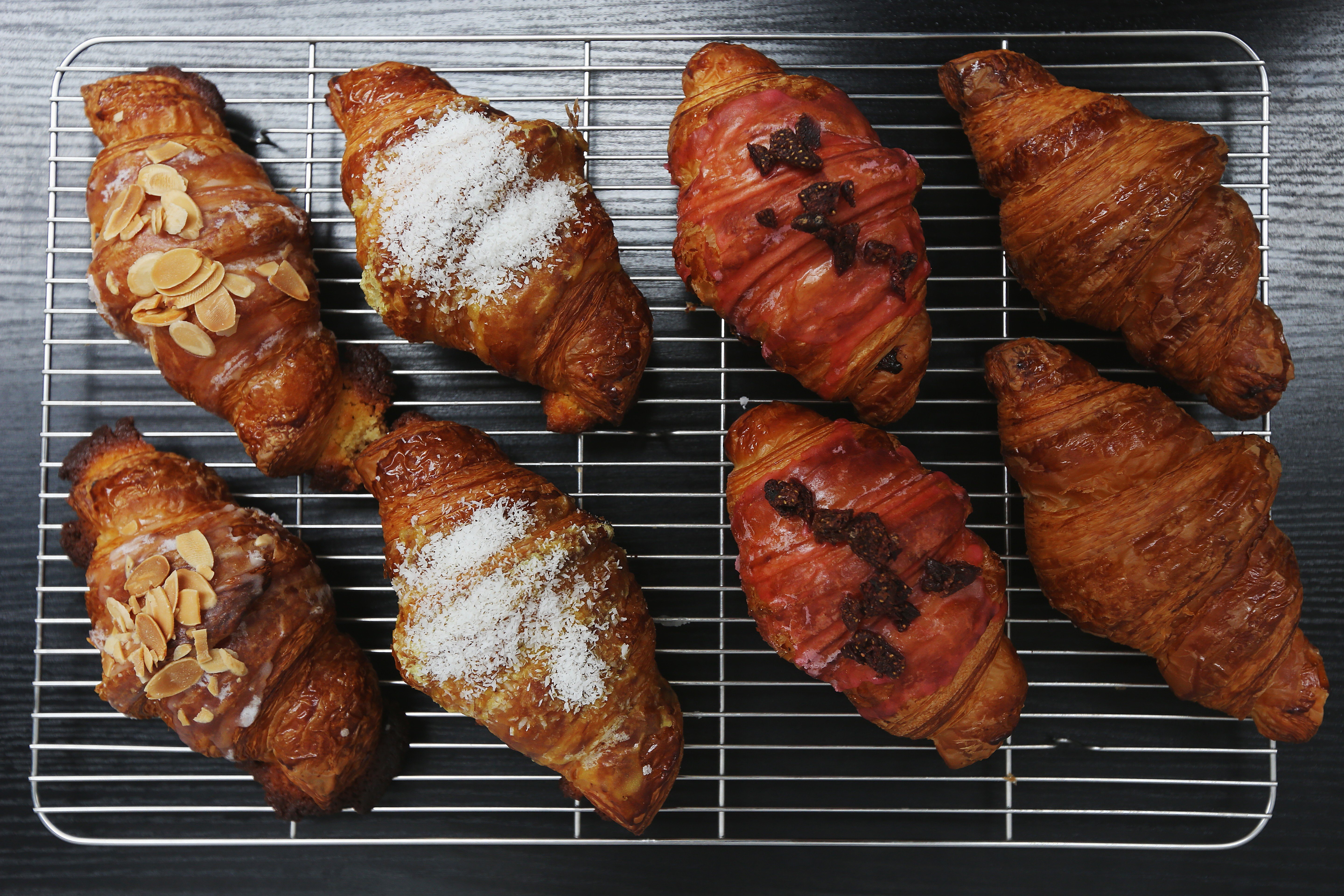 Croissants are the most popular pastry product at Plumcot in Tai Hung. This picture shows (from left) almond croissants, mango and coconut croissants, strawberry croissants, and regular croissants. Photo: Xiaomei Chen