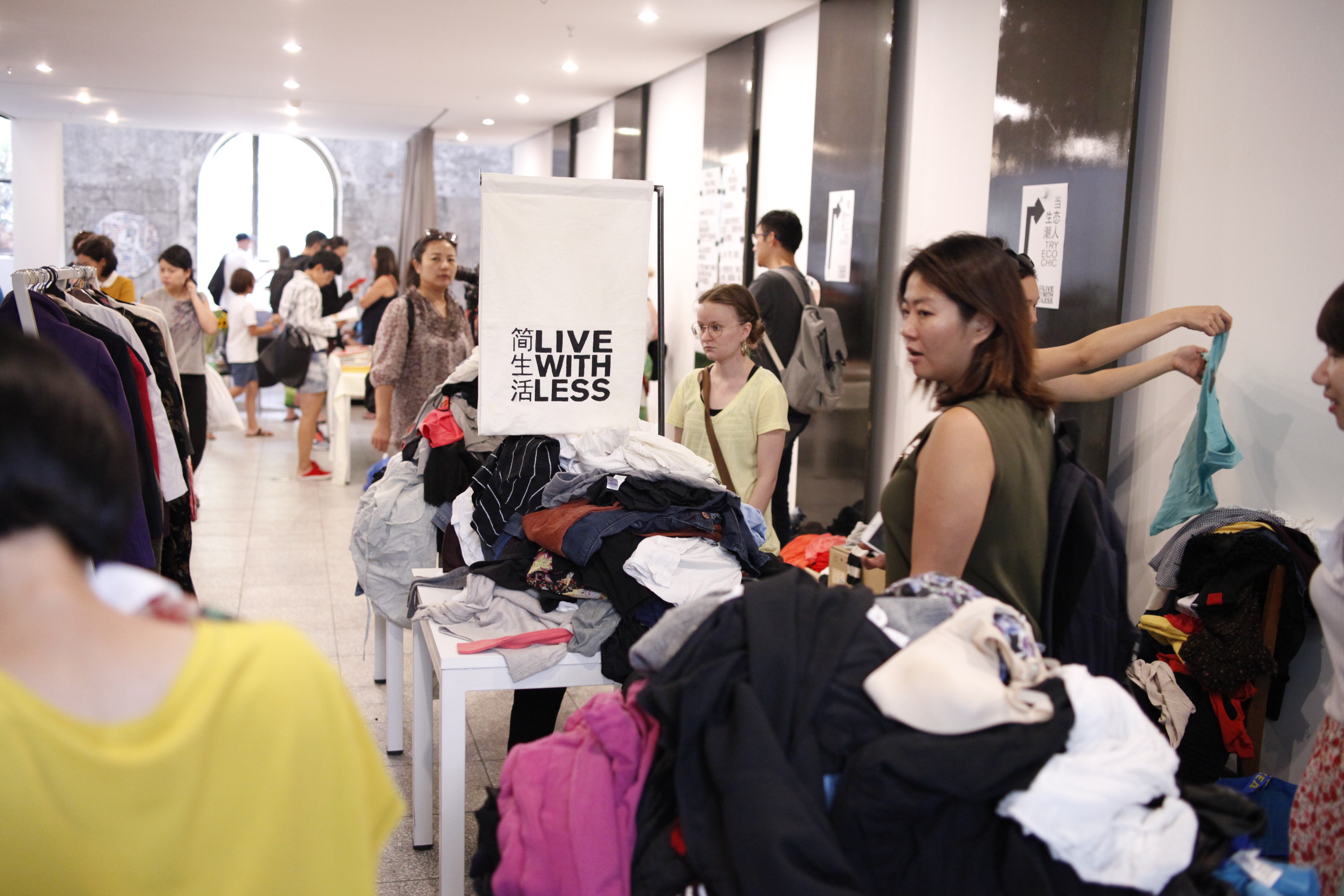 A Live With Less event in Beijing drew many customers looking for a second-hand bargain with a reduced carbon footprint.