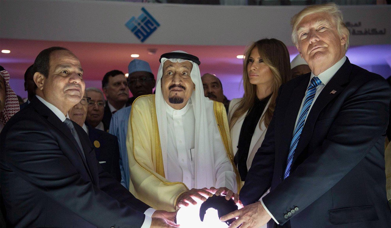 US President Donald Trump, King Salman of Saudi Arabia (centre) and Egyptian President Abdel Fattah al-Sisi (left) mark the opening of the World Centre for Countering Extremist Thought in Riyadh, Saudi Arabia on May 21, 2017. Photo: EPA/Saudi Press Agency