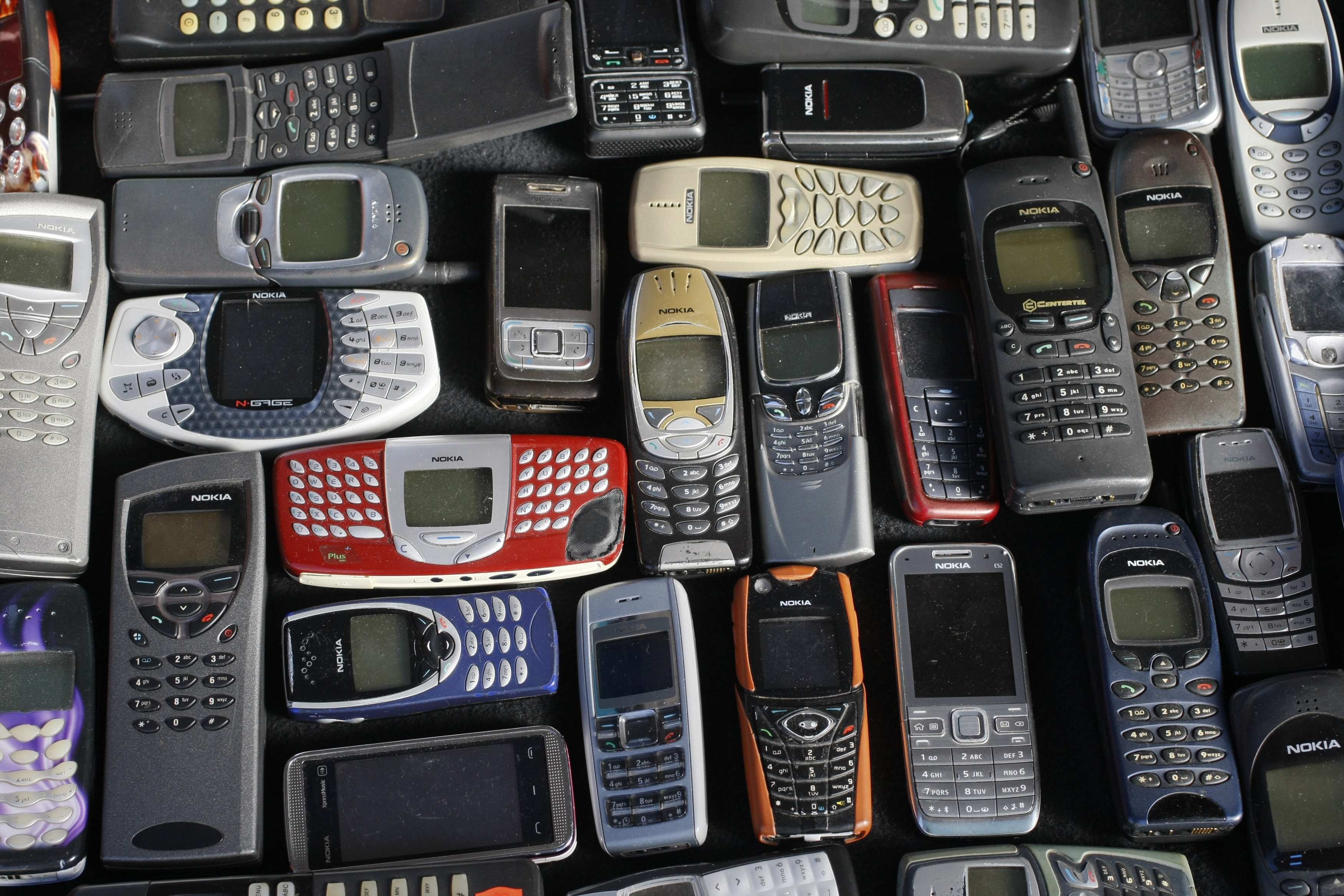 A collection of Nokia mobile phones. The company sold its mobile handset business to Microsoft for €5.44 billion in 2013. Photo: Reuters