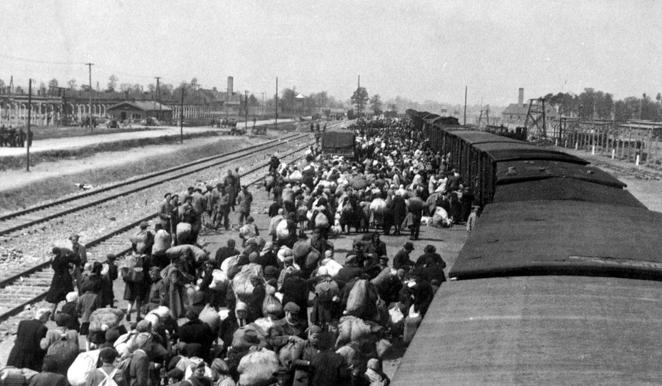 Jews get off a train in the Auschwitz-Birkenau extermination camp on May 27, 1944. Poland's senate on February 1 passed a controversial Holocaust bill designed to defend the country's image in relation to the second world war atrocities. Photo: AFP