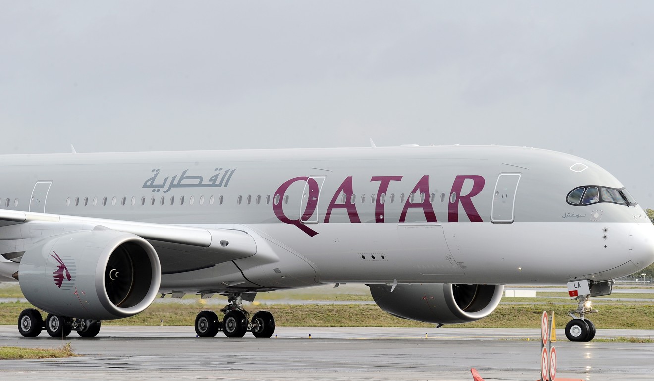 A photo taken on December 11, 2014 shows the first Airbus A350 bearing the Qatar airline company logo on the tarmac of Toulouse Blagnac airport, southwestern France. Photo: AFP