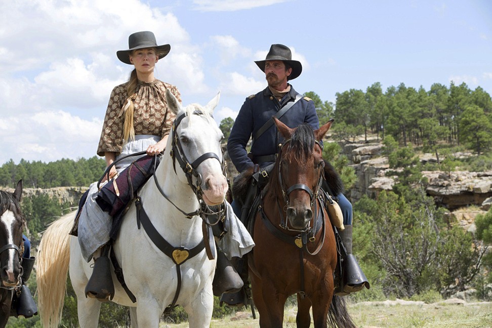Rosamund Pike (left) and Christian Bale in a scene from Hostiles. Photo: AP